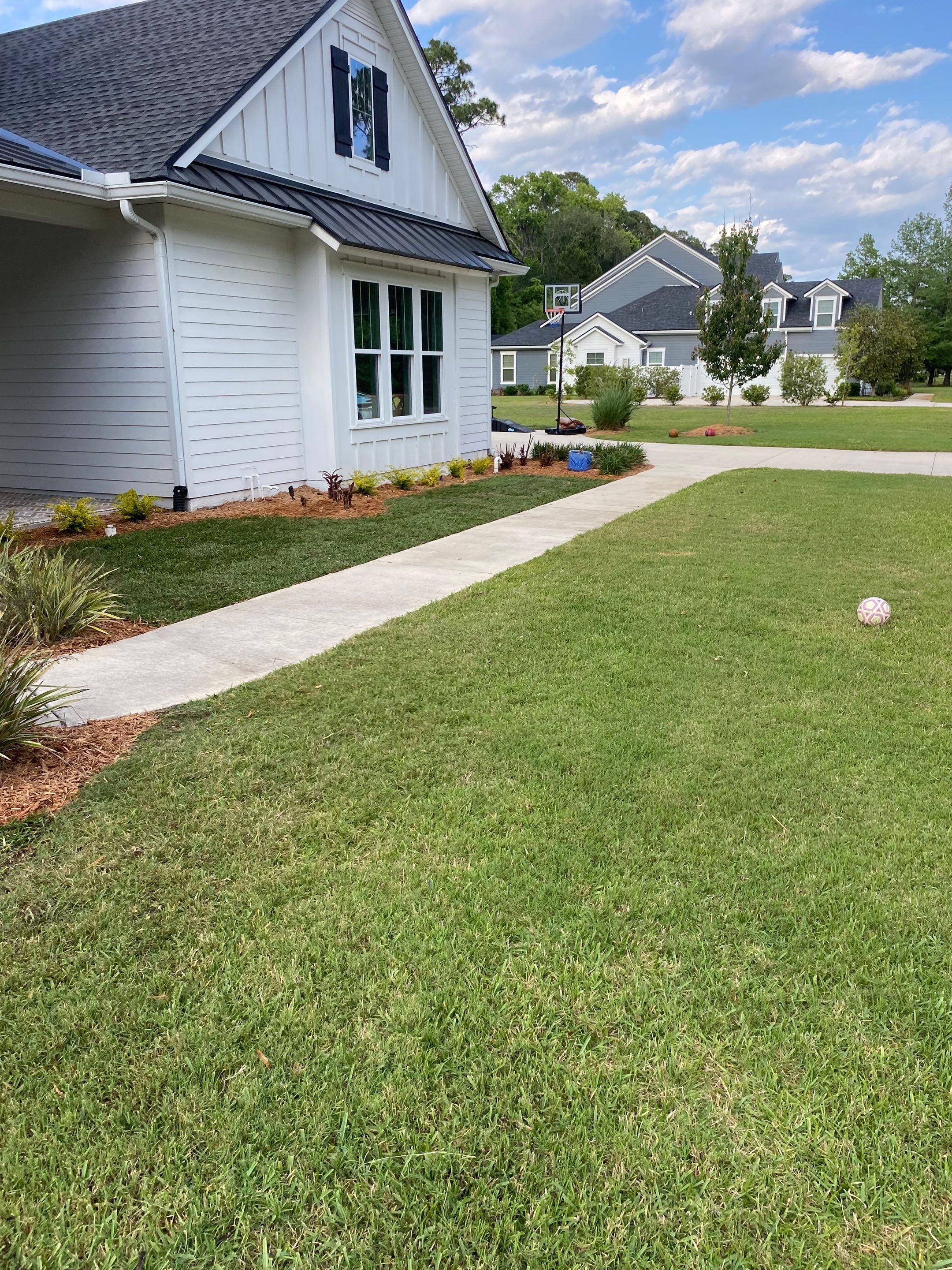 Residential | Clean-Up, Sod & Rock Installation by ProGreen Services