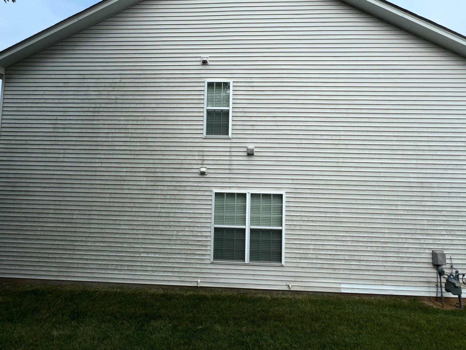 pressure washing exterior siding removing dirt mold algae for home maintenance and cleaning