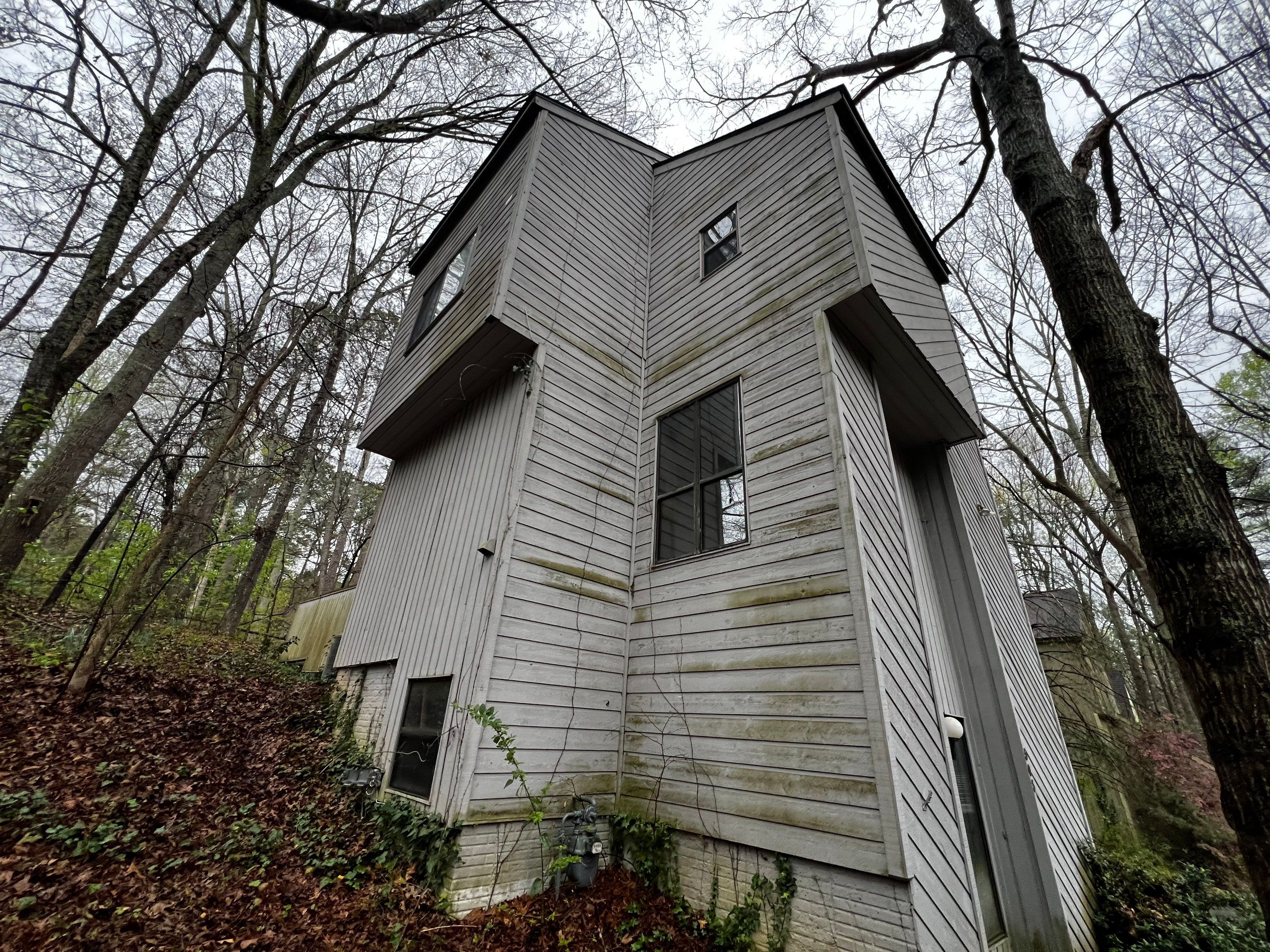 Modern Marietta Home Transformation with Custom Kitchen and Vertical Siding by Swift Home Renovations