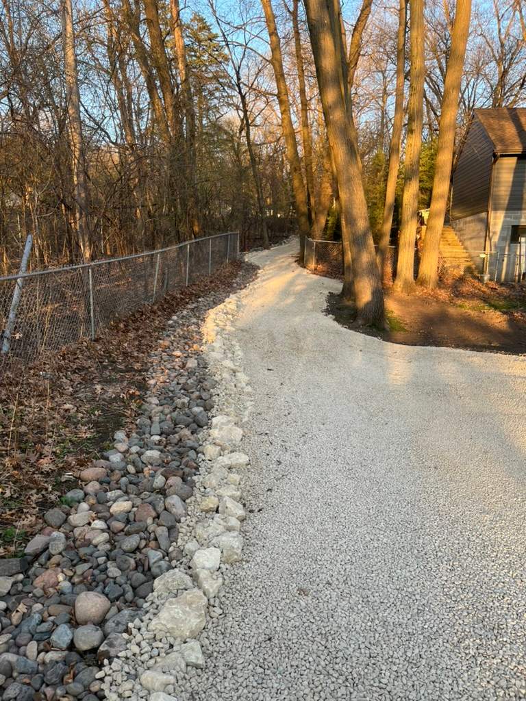 Limestone Boulder Wall  by Sota landscaping