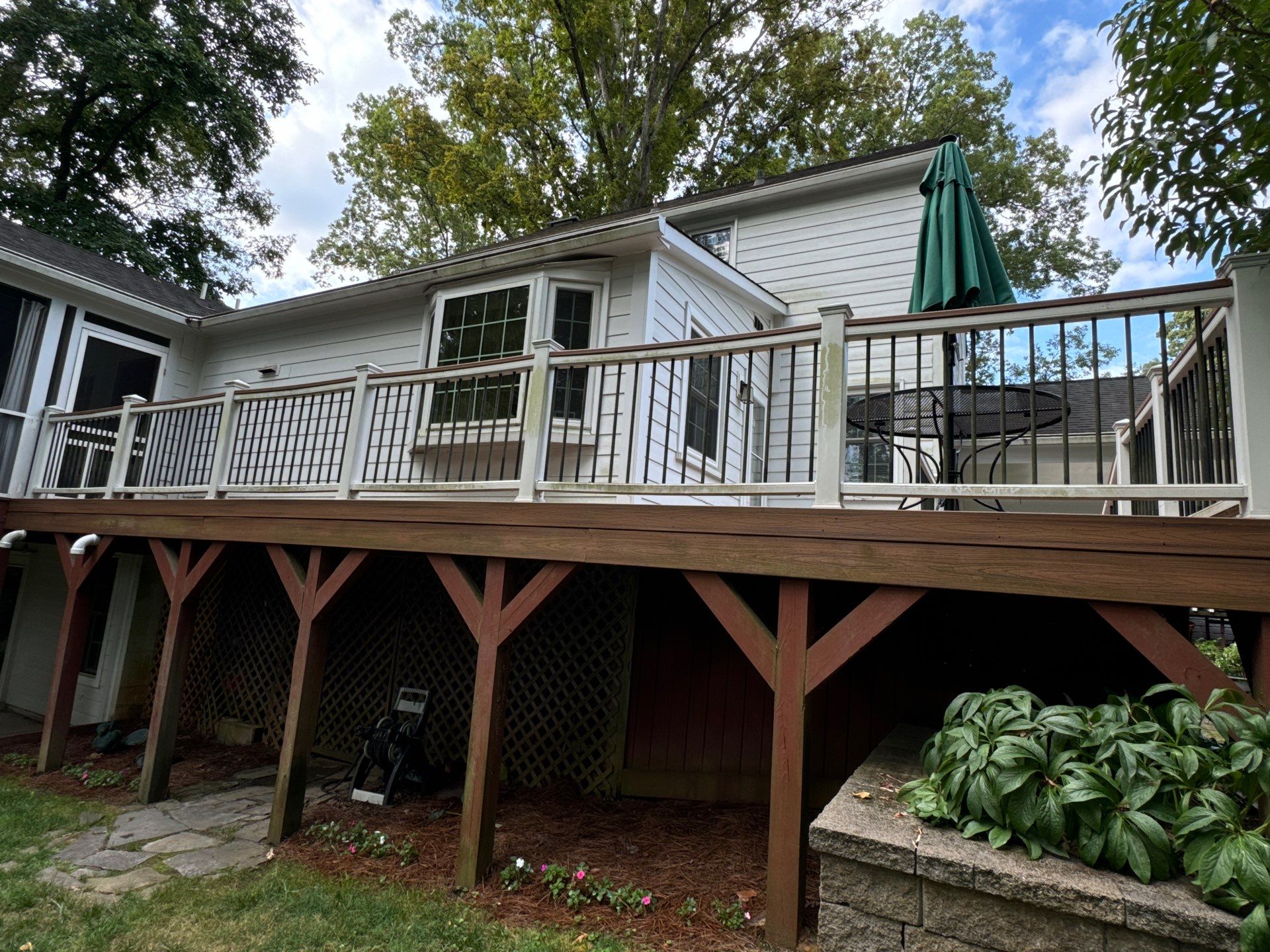 pressure washing deck railings siding and foundation area of a house in winston salem nc