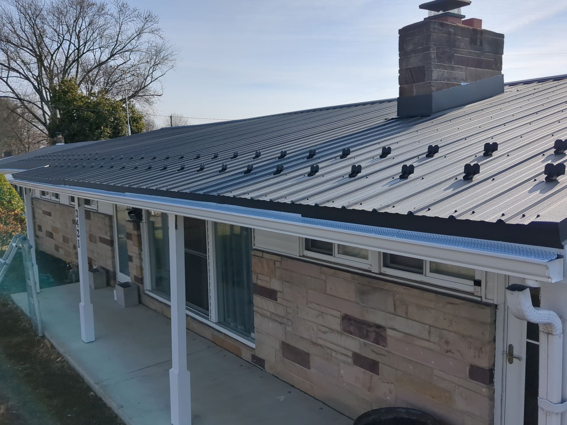 Metal Roofing Installation and Stone Veneer Exterior Refresh in Camp Hill by Esh Builders