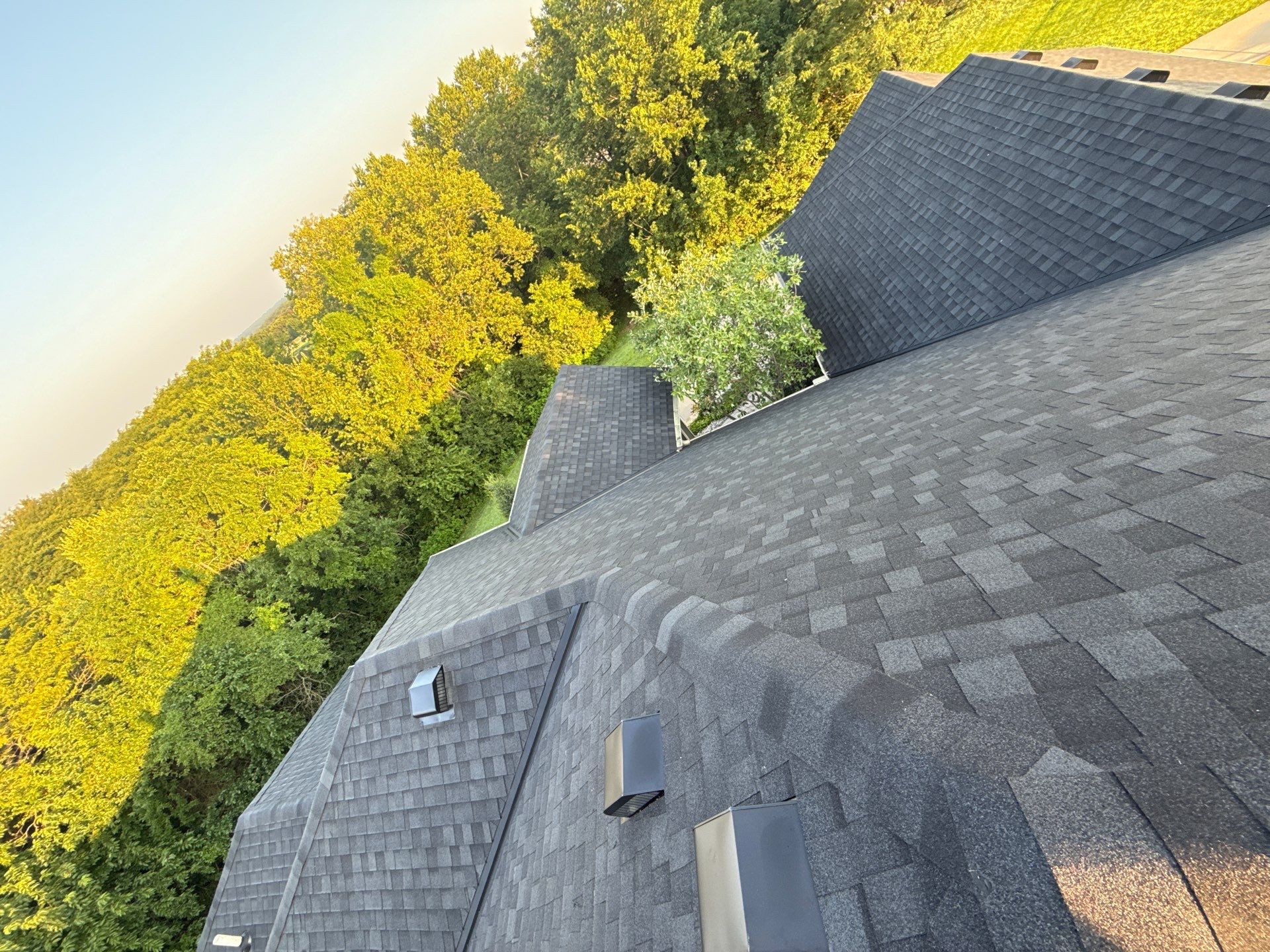 Rustic Black roof by Victor Construction