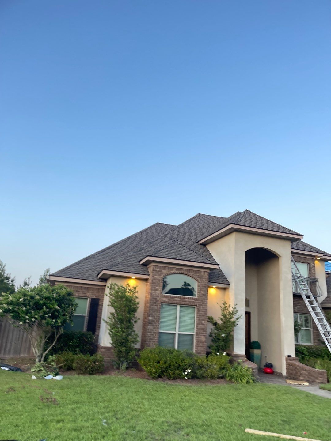 Residential Roofing Installation using Roof Replacement by American Roofing & Construction LLC