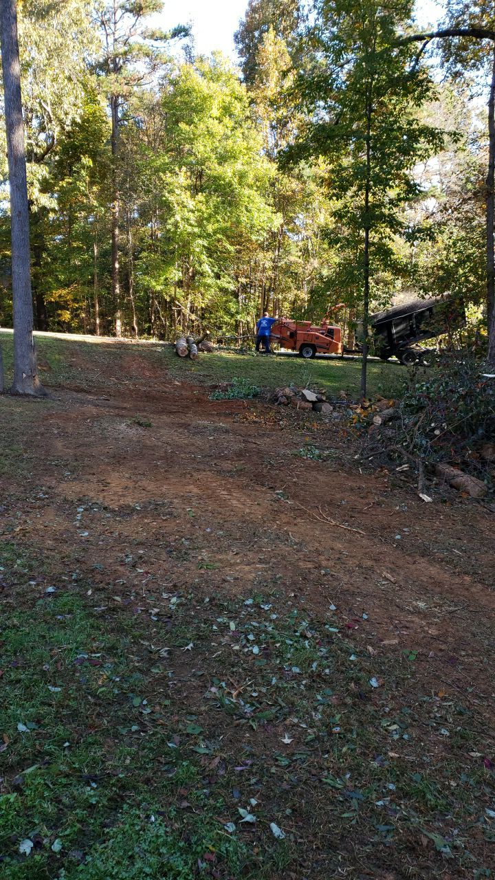 land clearing using machinery by Power Wash Masters LLC