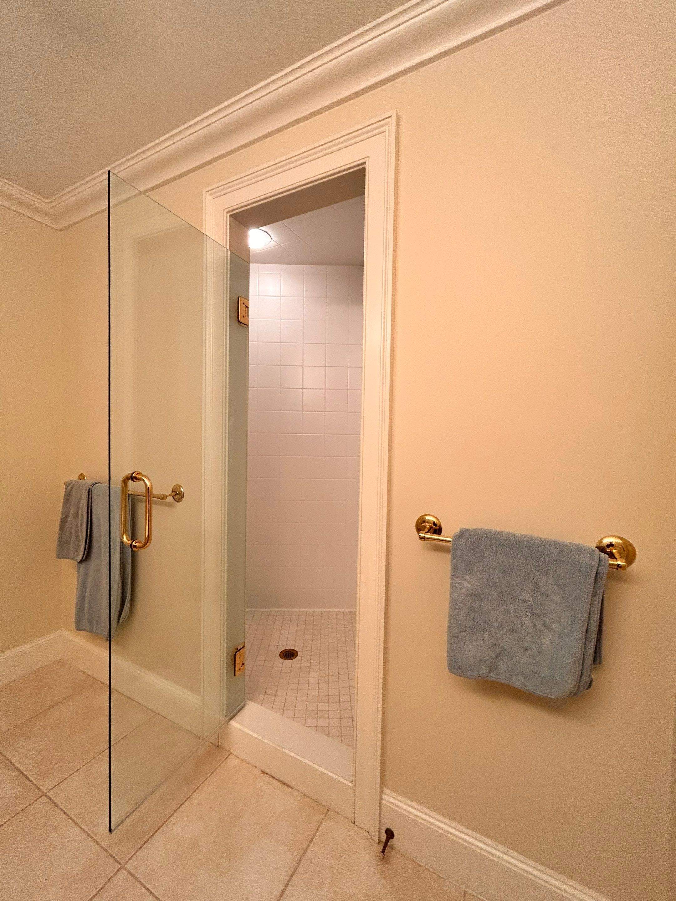 Multiple Frameless Shower Doors by Cheshire Glass Company