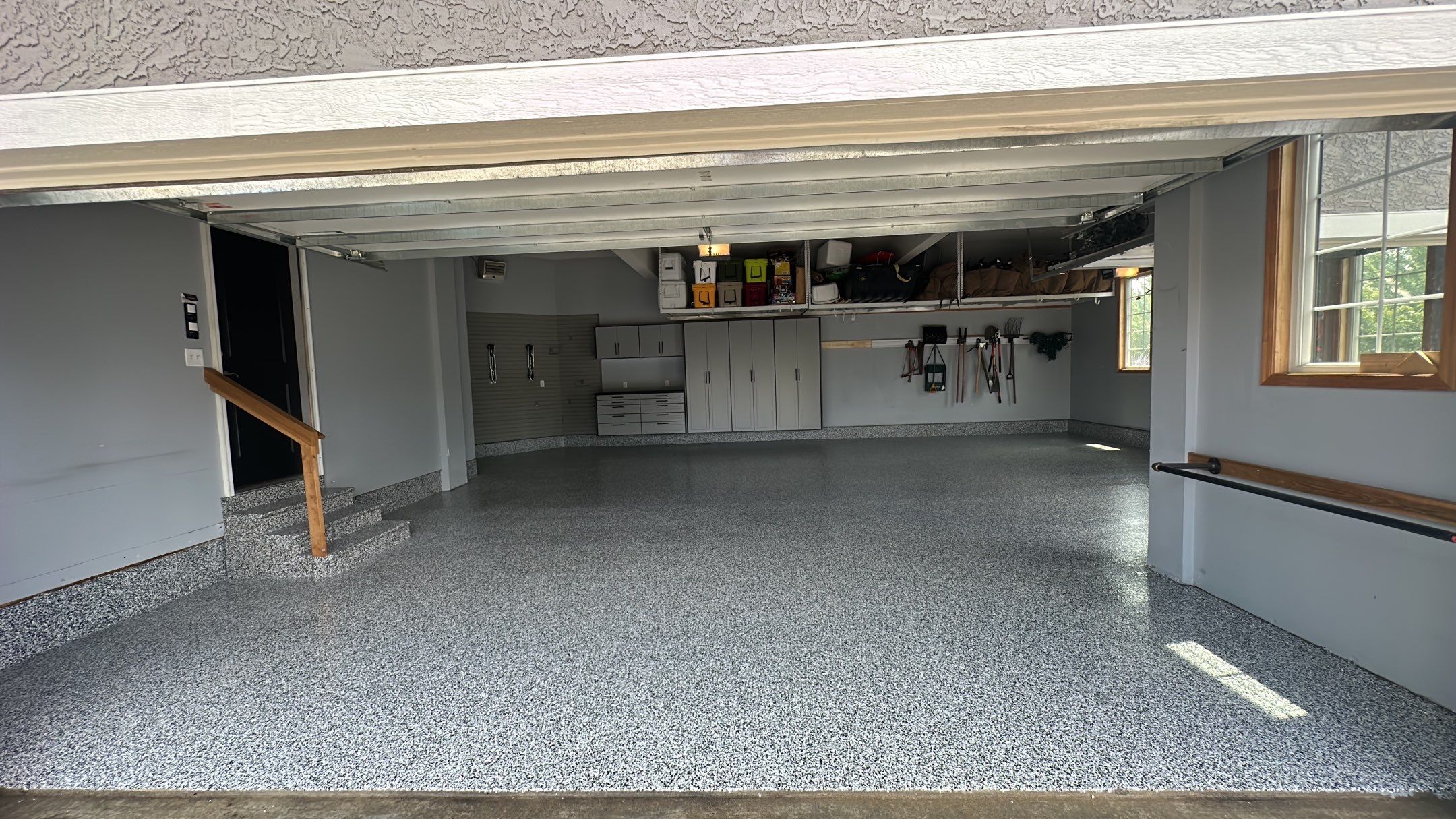 Matt N. took his garage to the next level with our Domino floor and cabinets  by Banner Garage
