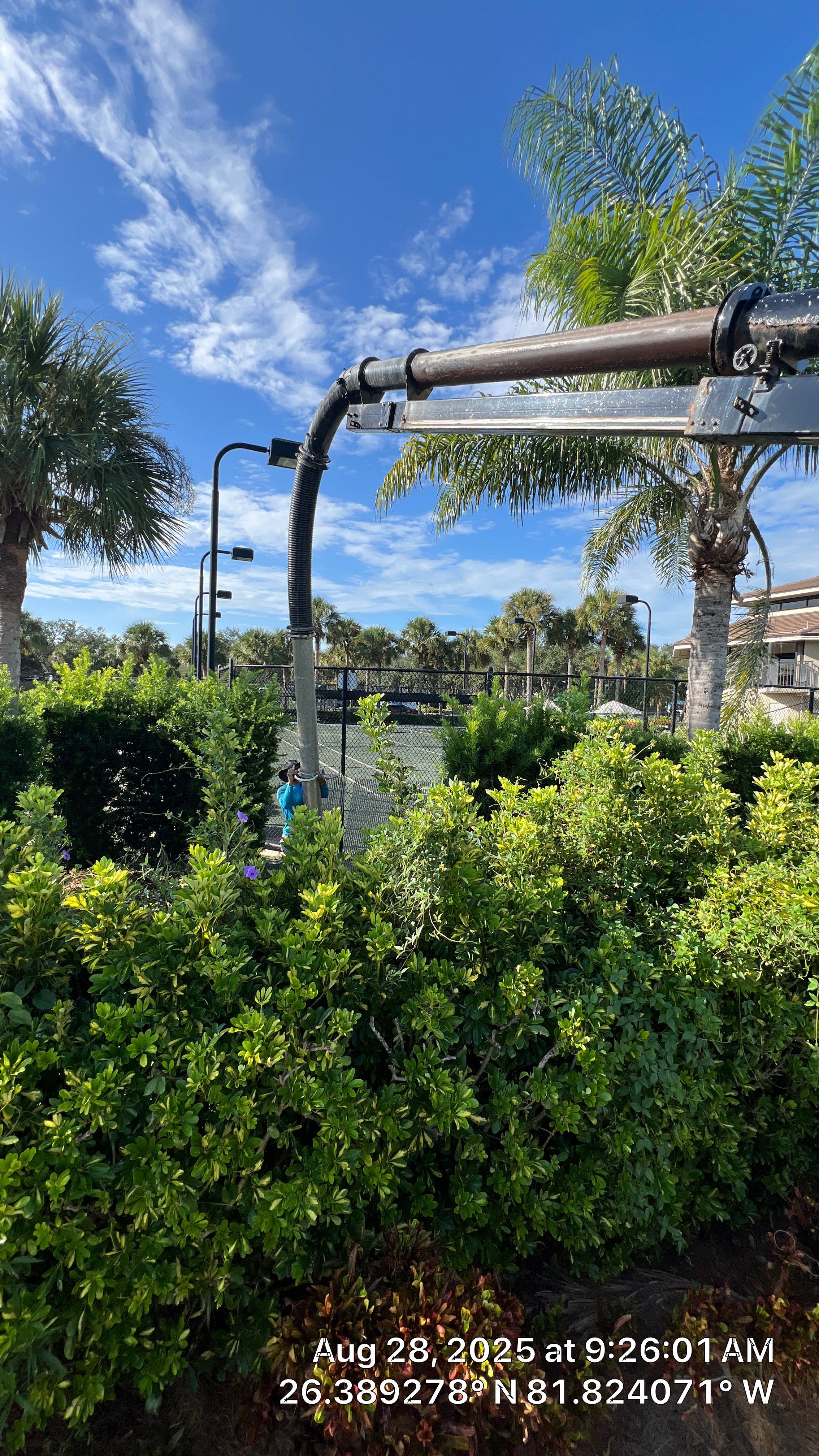 Pelican Landing Tennis Court Catch Basin Cleaning by APS Power & Water