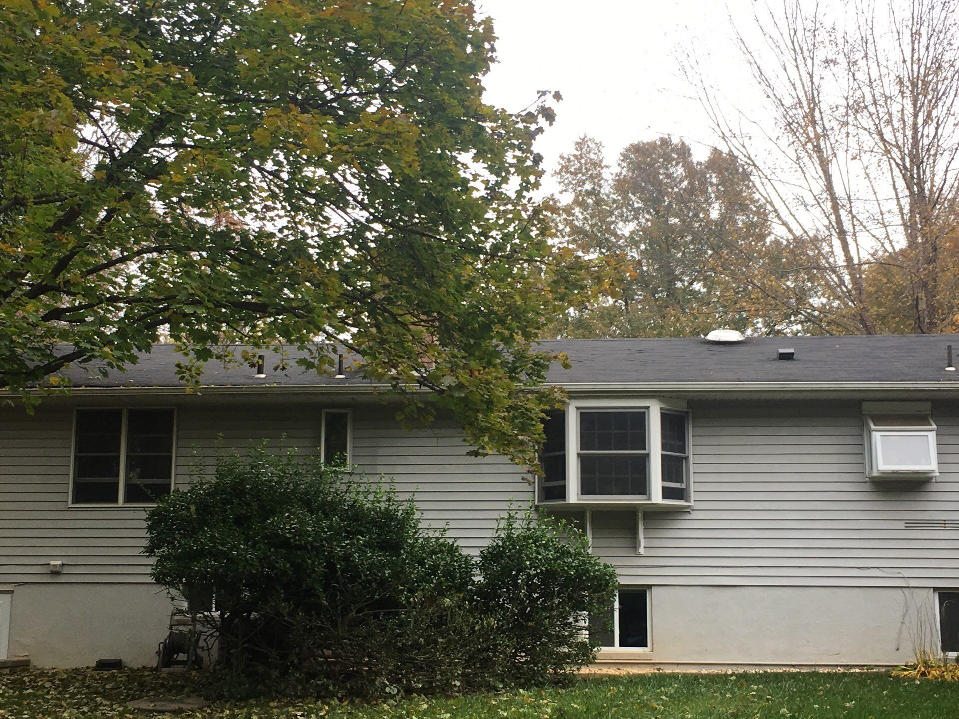 Roof and Skylight Replacement by American Home Contractors