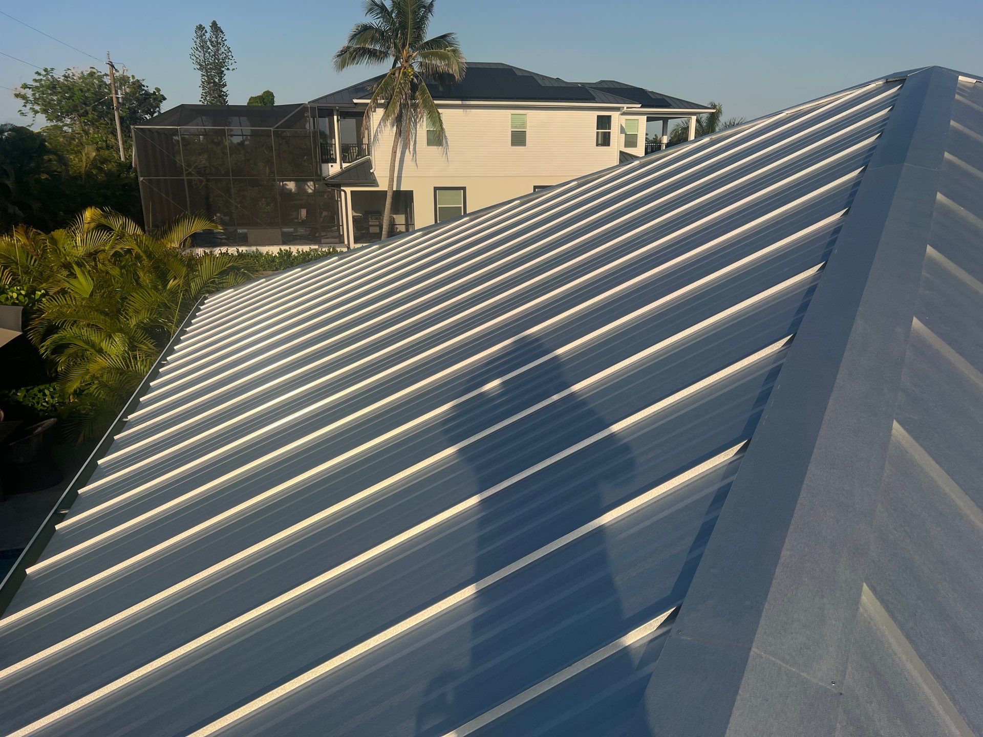 Residential Roofing Installation using Galvalume Standing Seam by Durabilis Roofing INC