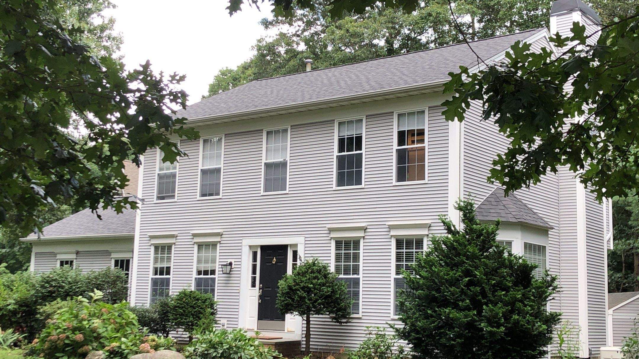Pewterwood Roofs by Pinnacle Roofing & Skylights