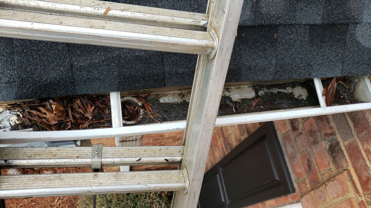 Gutter Cleaning using water by Power Wash Masters LLC