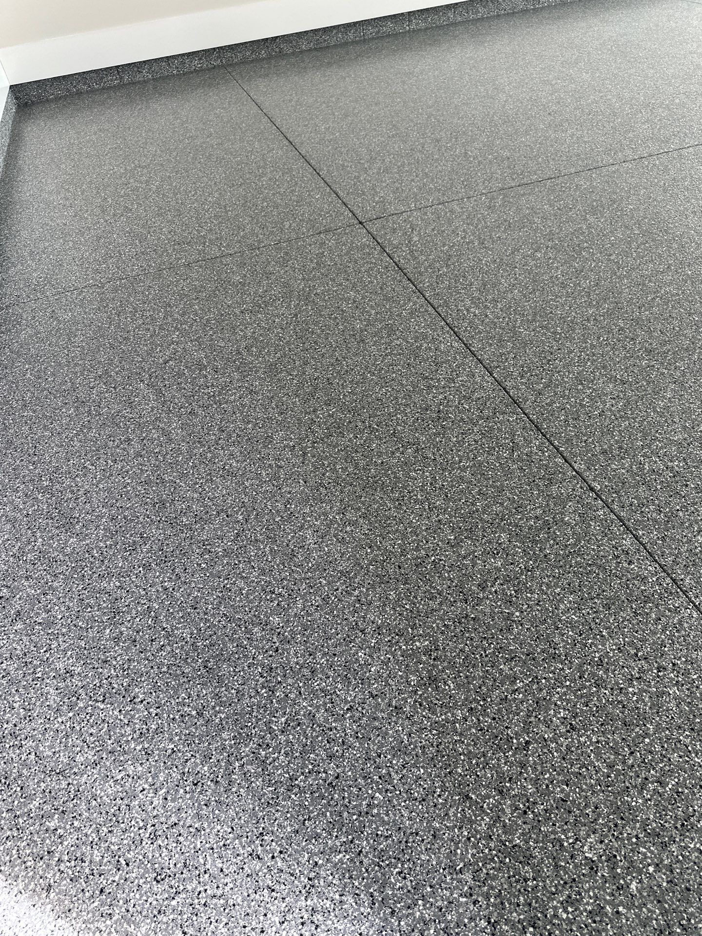 Garage Floor Coating using Wombat by My Garage Floor Guys