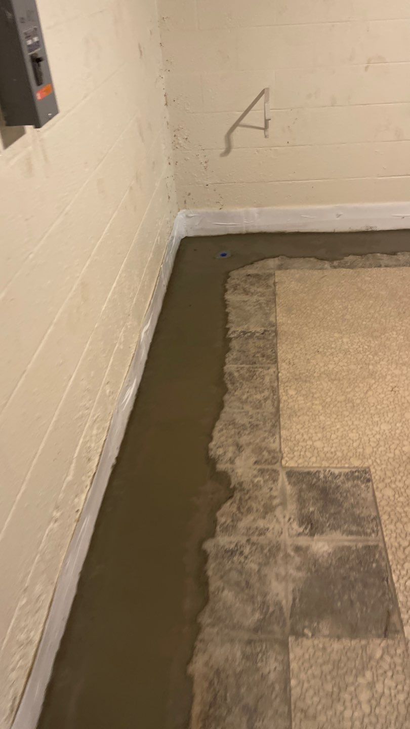 Interior Waterproofing Using GrateDrain™ Products by Toledo Basement Repair 