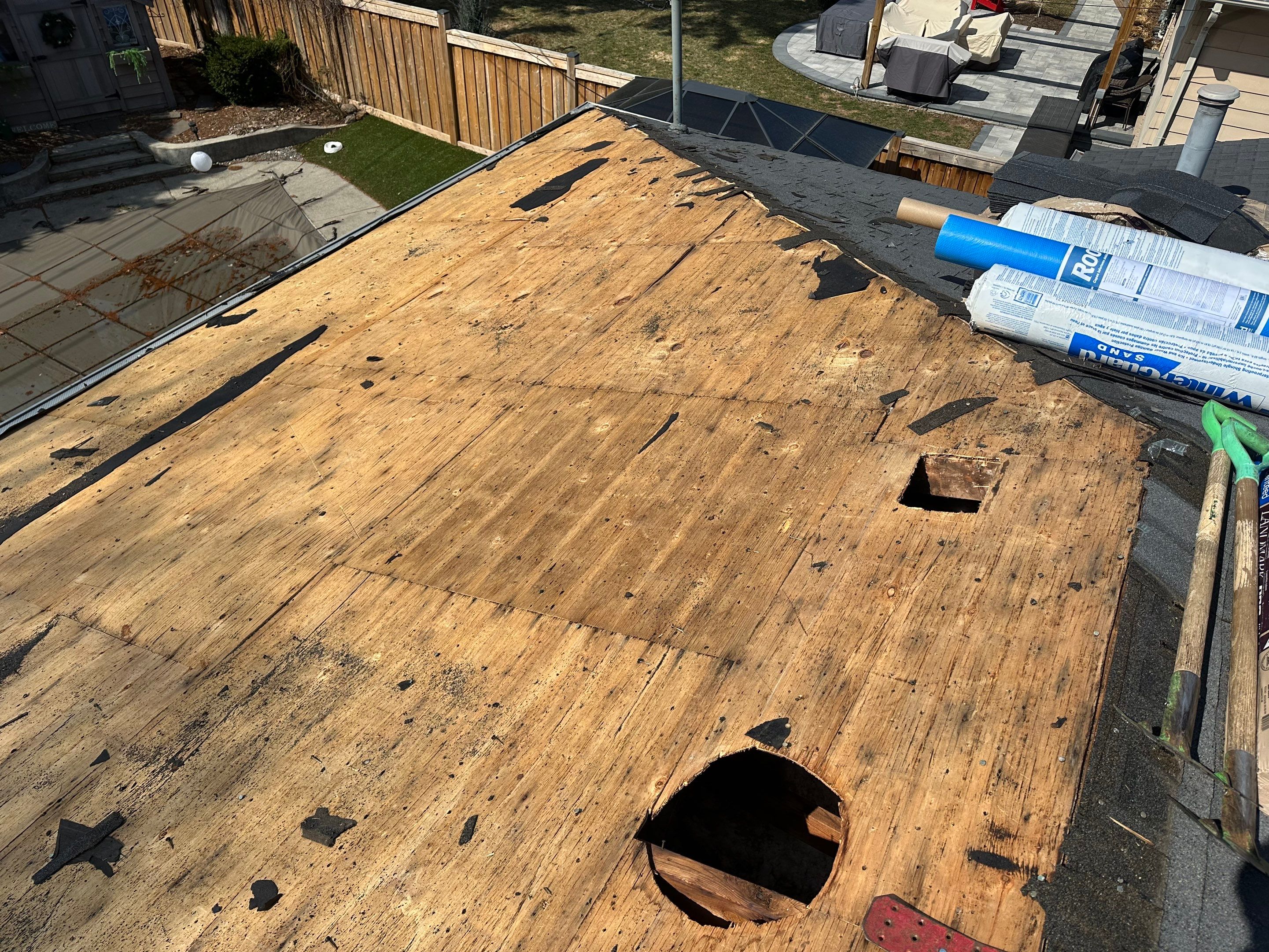 Project in Burlington by The Roofing Crew