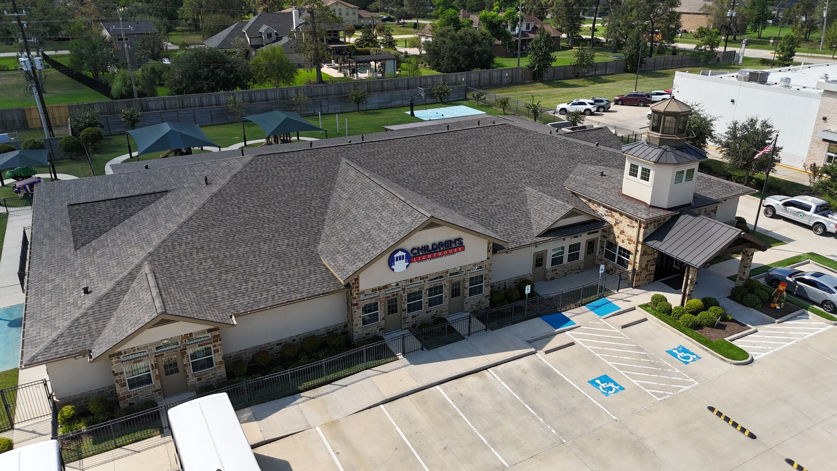 Roof Replacement on a Daycare! by Core Four Roofing