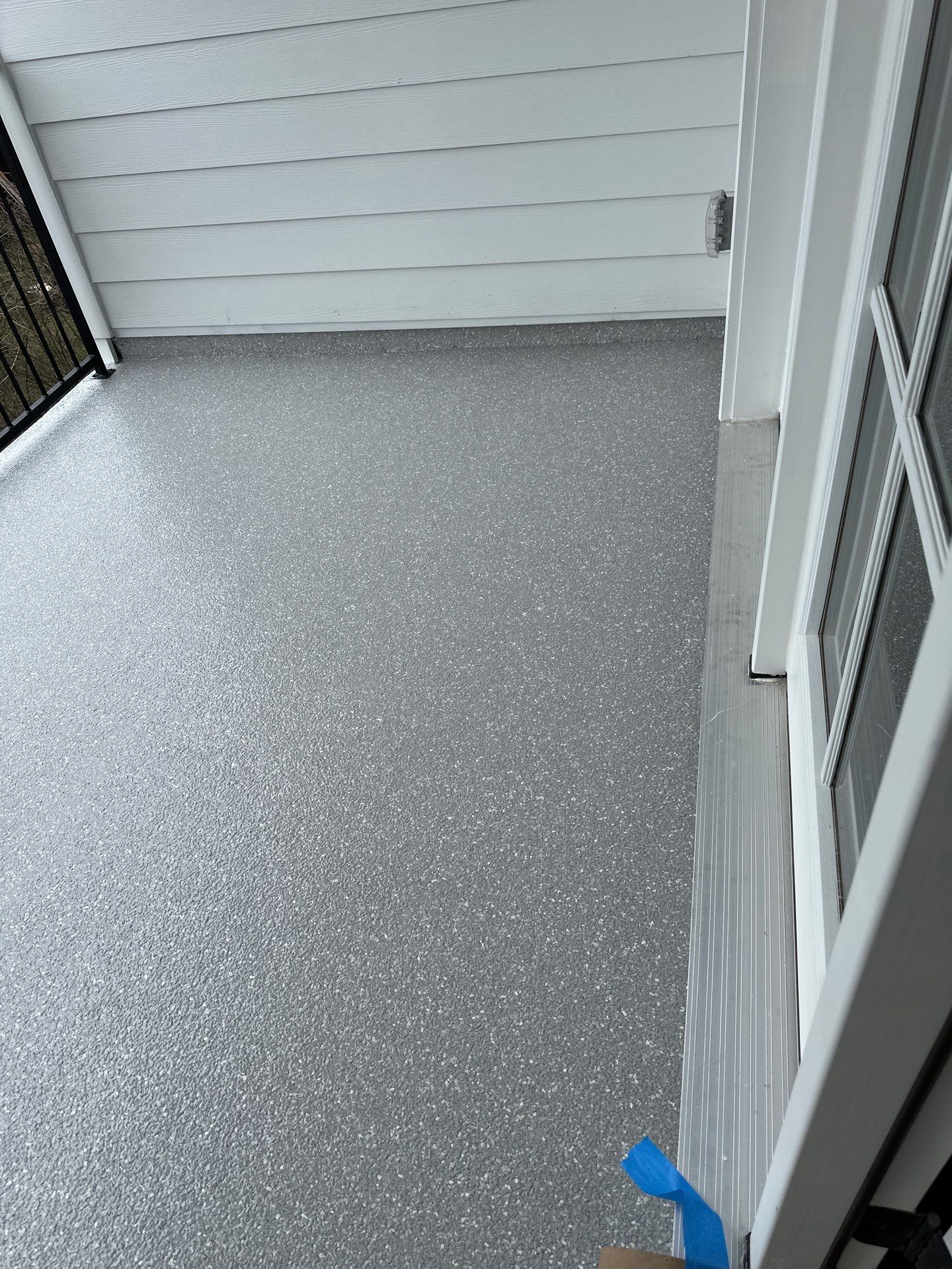 Patio Floor Coating using Custom Color by My Garage Floor Guys