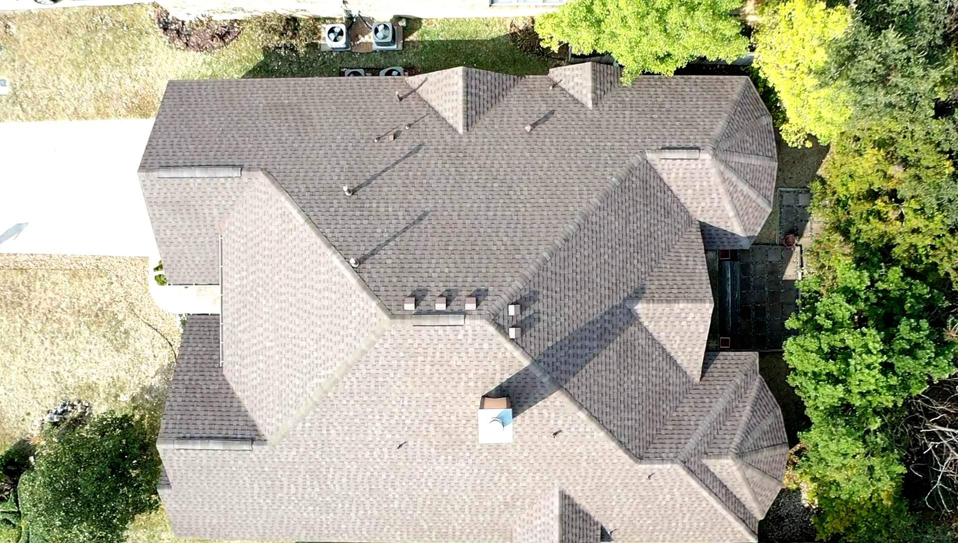 Residential Roof Replacement using Pinnacle Pristine 30 Year Laminate Shingles by Premier Roofing and Contracting