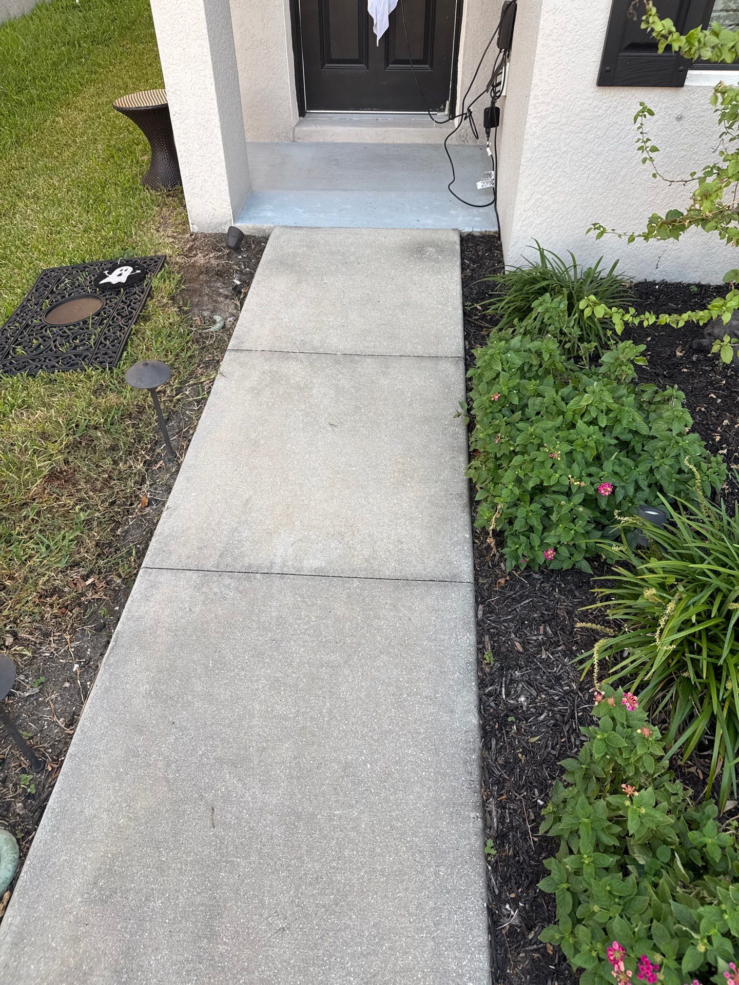 Concrete Driveway, Sidewalk, Street Curbing, and Entryway Cleaning in Willow Walk Community, Palmetto, FL by Sunshine AquaWash