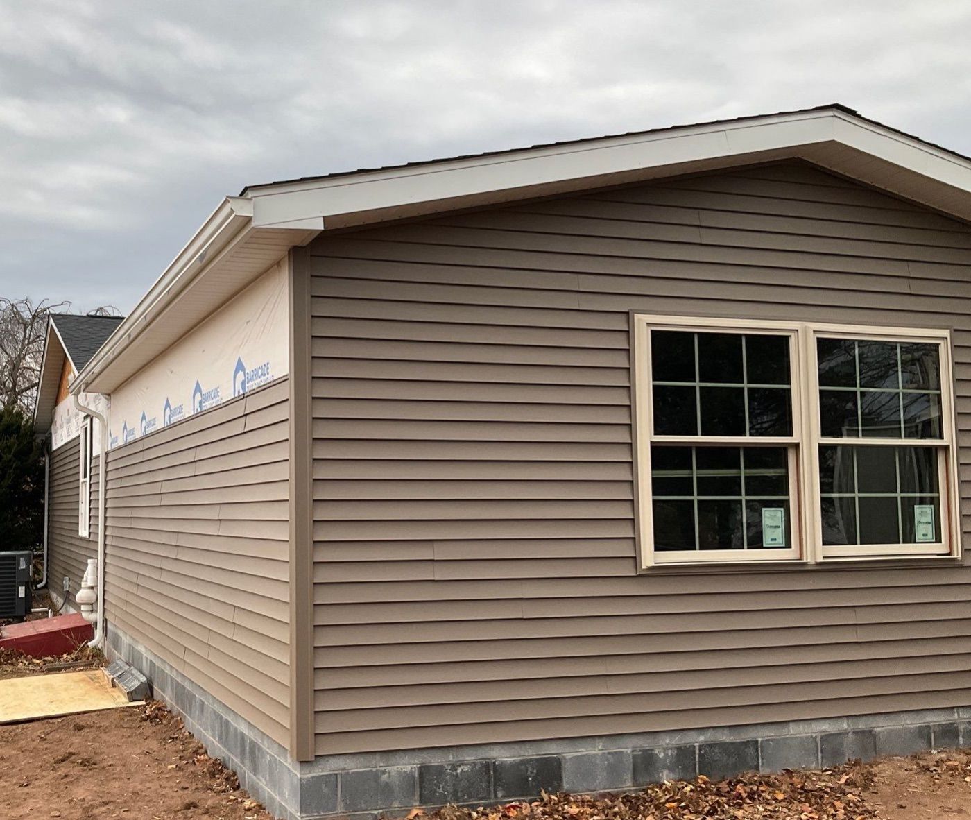 Residential Addition and Covered Porch Roof by Esh Builders