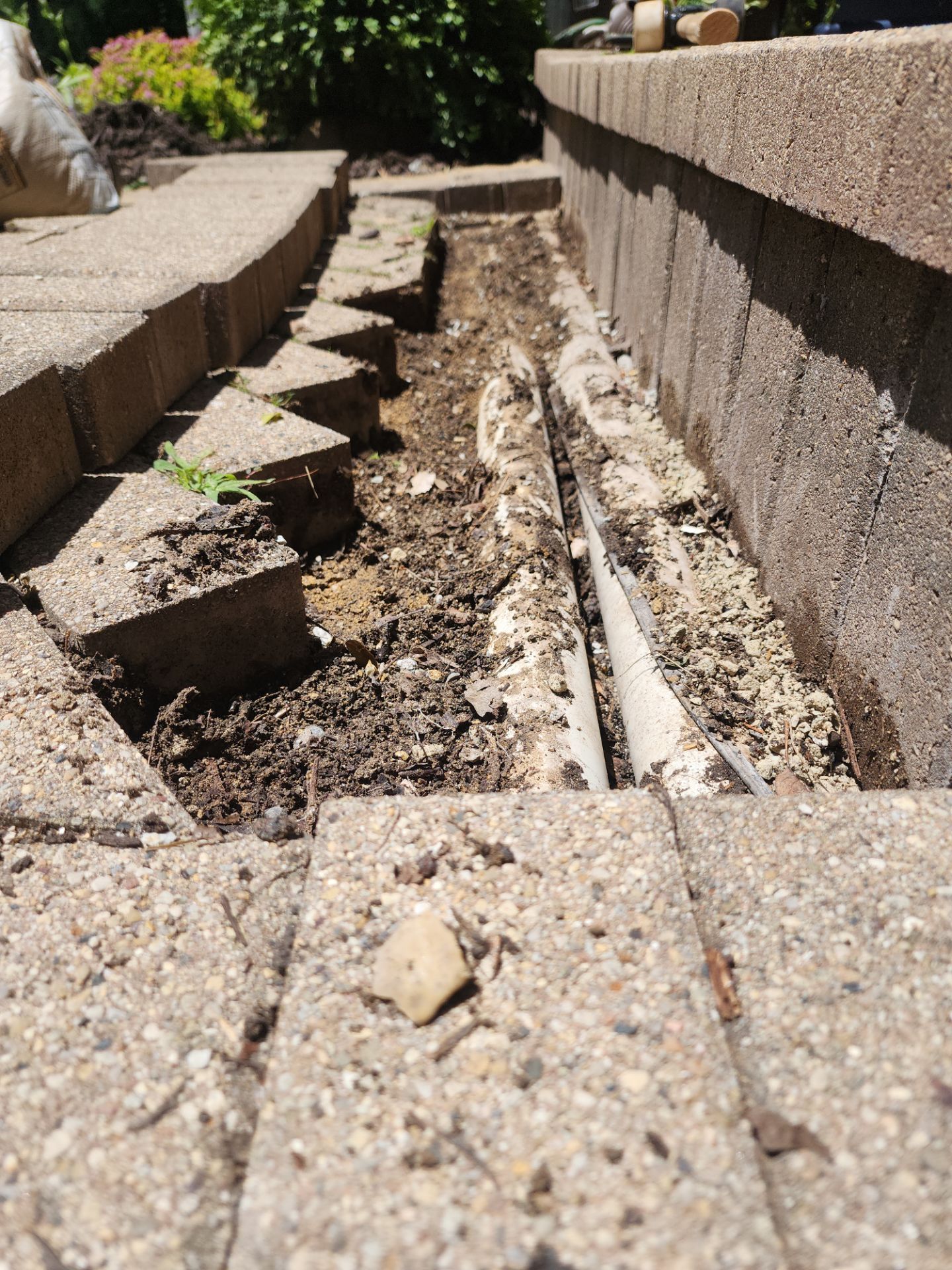 Brick paver repair, cleaning and sealing by Northern Power Washing LLC.