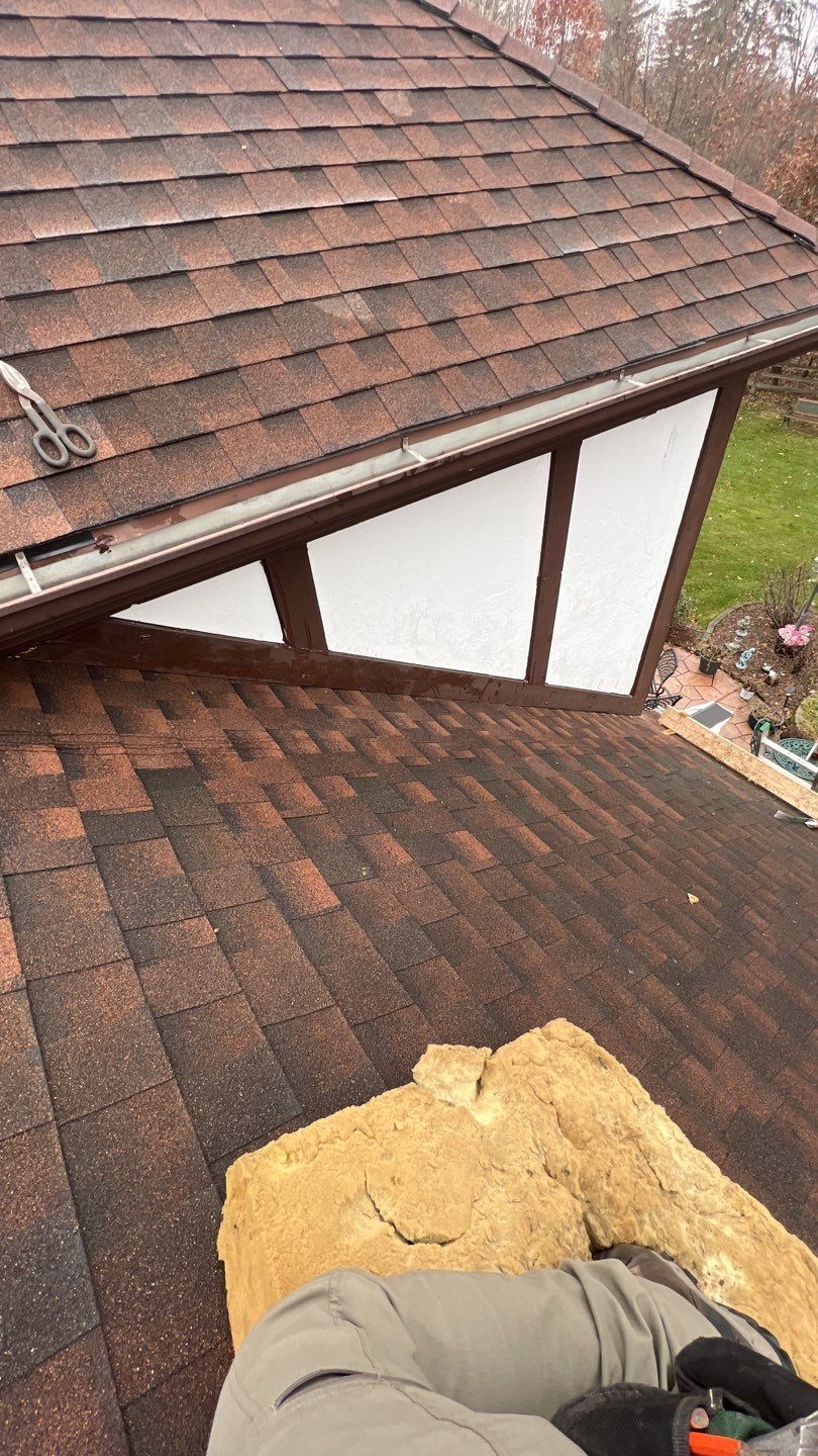Step flashing repair on roof to wall by Pro Home Services Inc