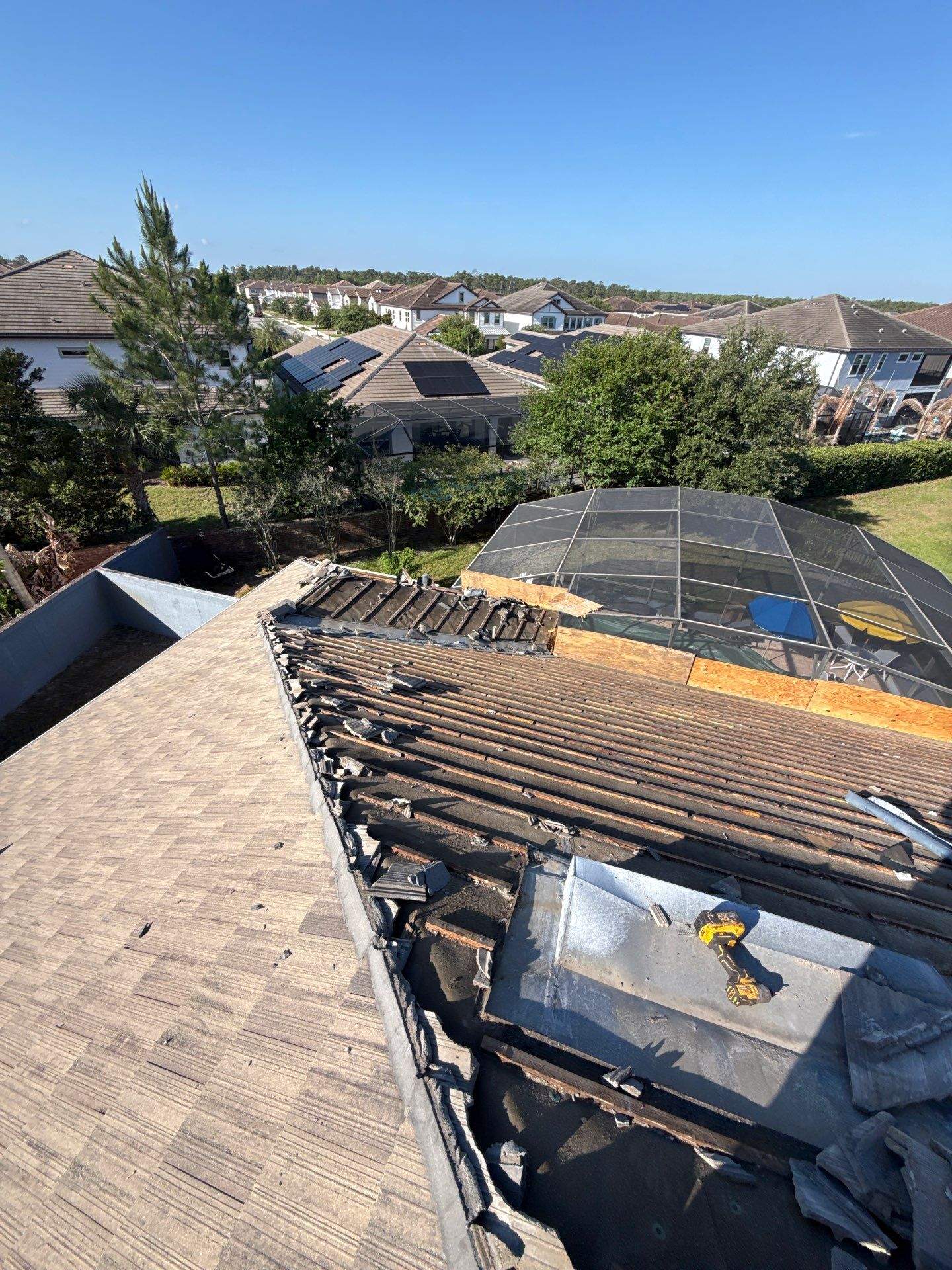 Winter Park Concrete Tile Roof Replacement and Chimney Flashing Installation by Fortified Roofing Solutions Corp.