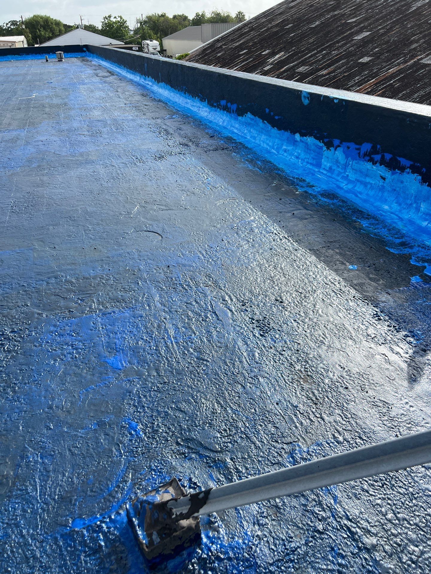 Dirty leaking Gravel Roof by Bayfront Roofing and Construction