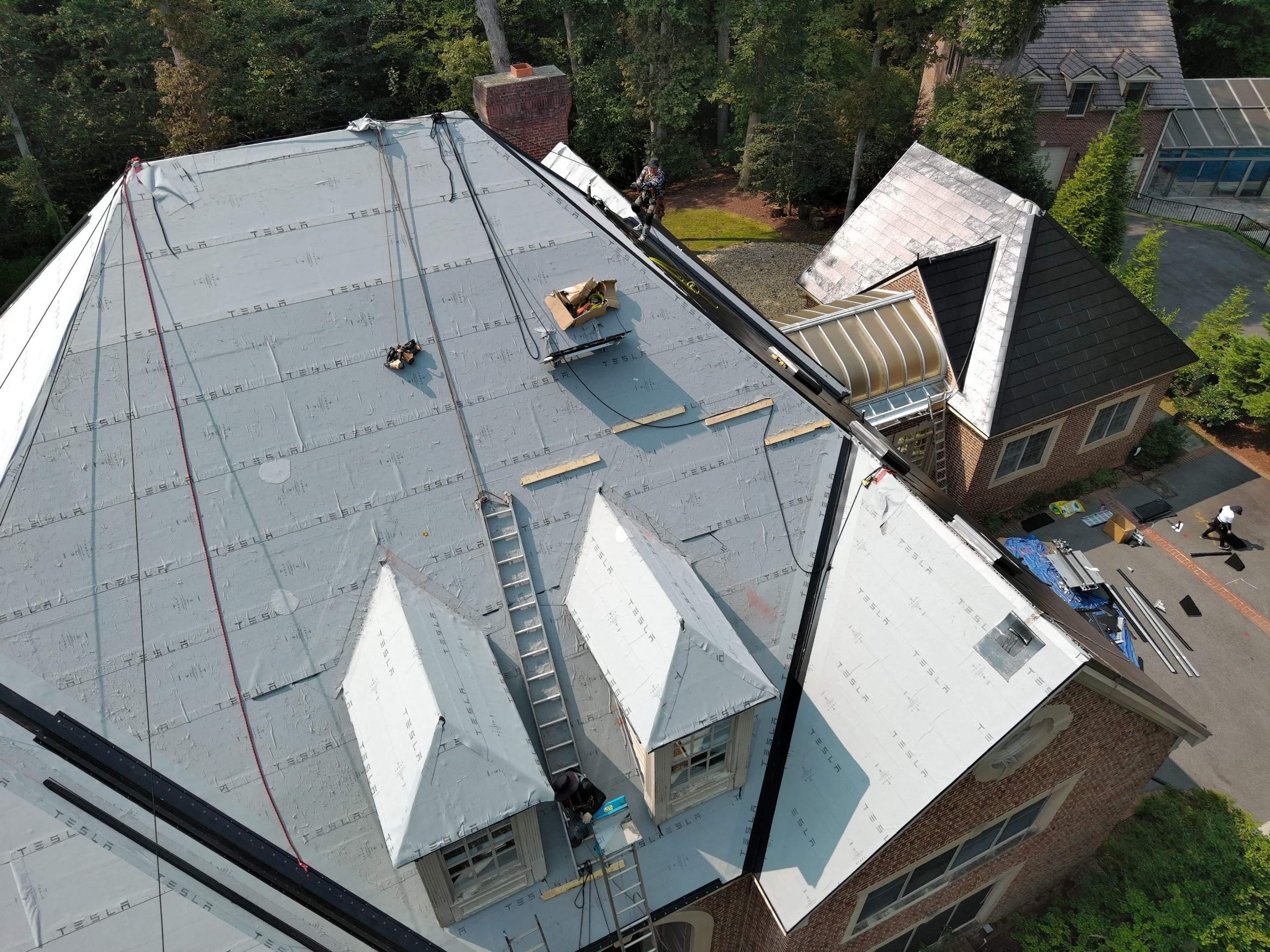 Extravagant Tesla Solar Roof in Maryland by American Home Contractors
