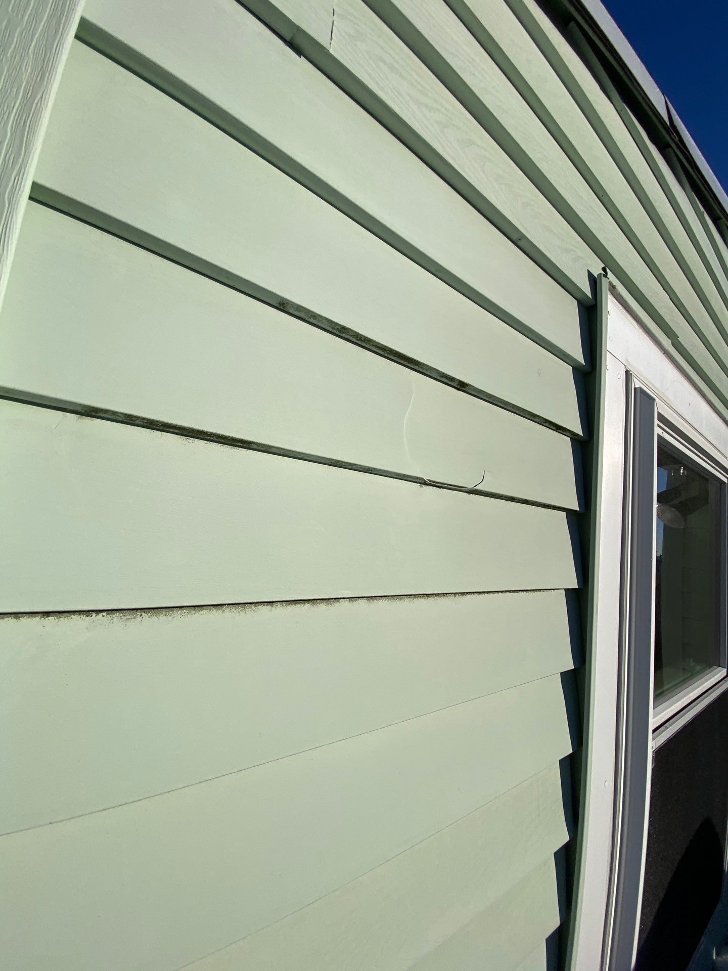 Vinyl Siding Repair & Replacement in Lowell, MA by Mighty Dog Roofing of Greater Middlesex County