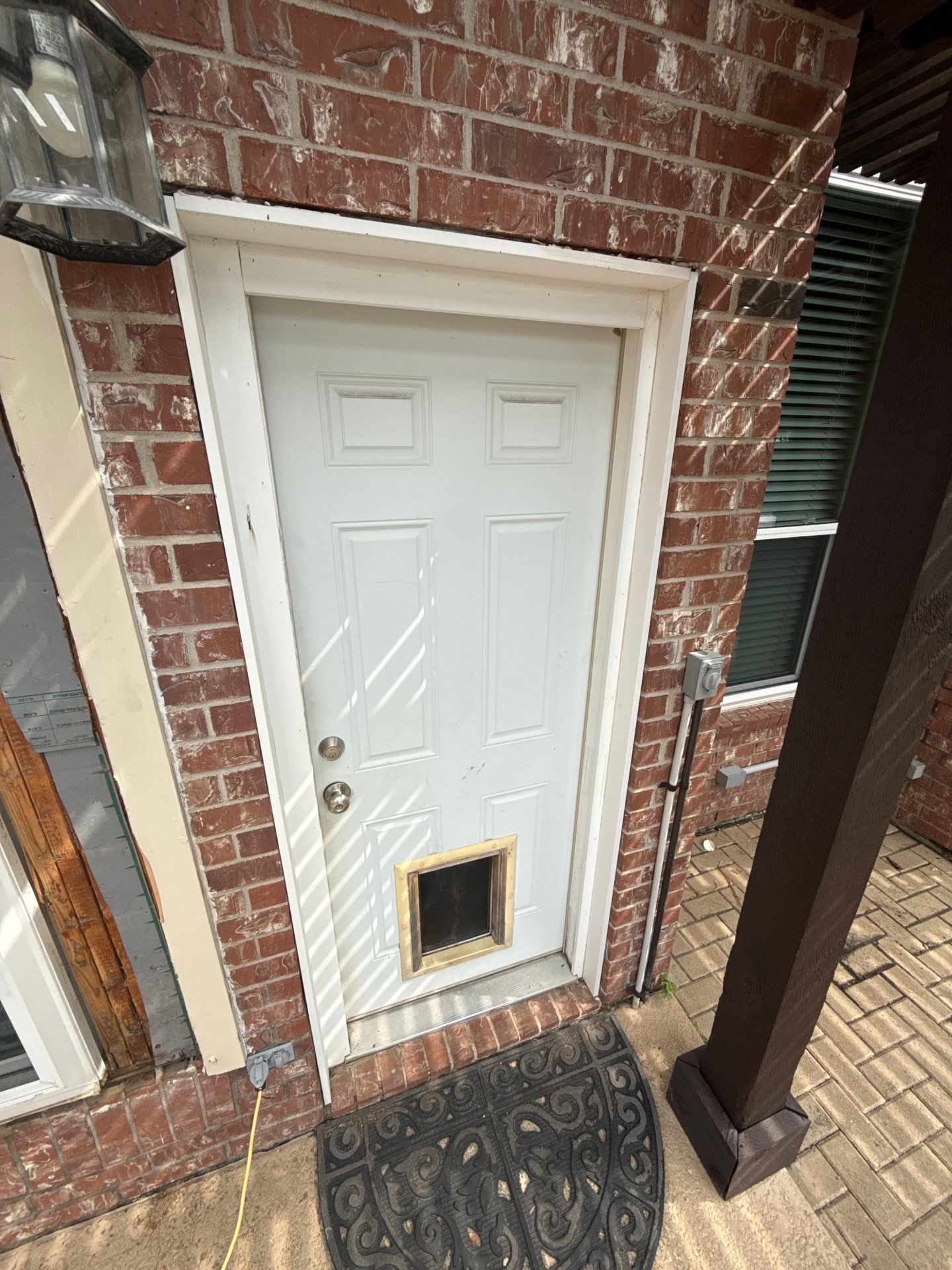 Dog Door Replacement by First Out Roofing 