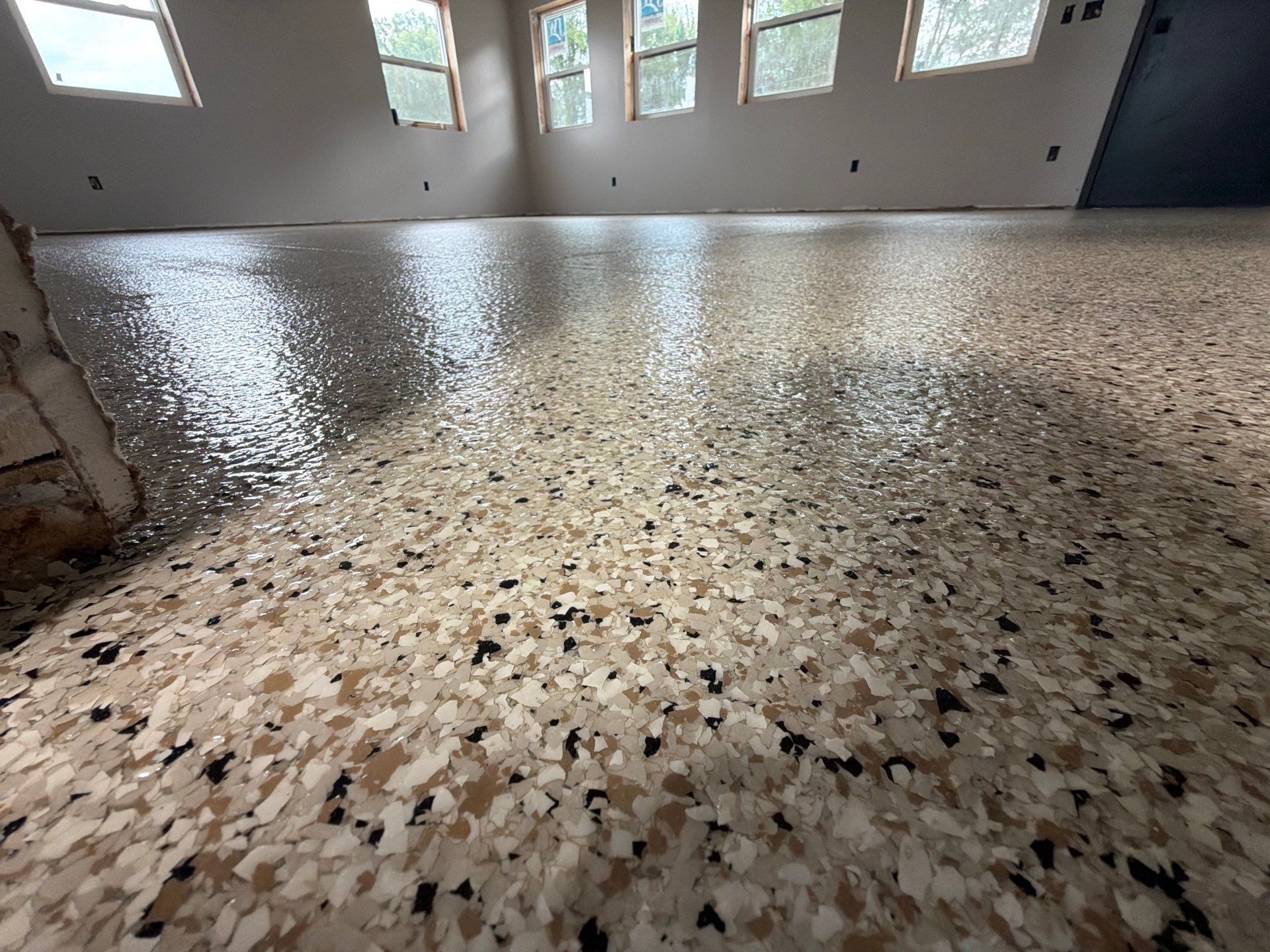 ShoreLine Epoxy Flake Floor Installation for Grand Haven Workshop by Gordon Painting