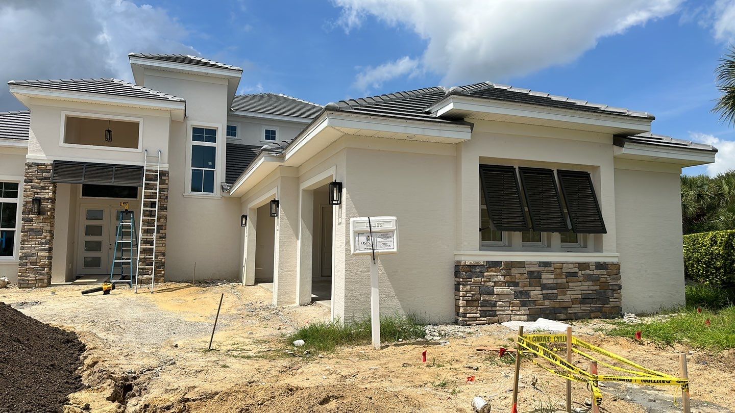 Bahama Shutters in Umbra Gray by Smart Guard Shutters