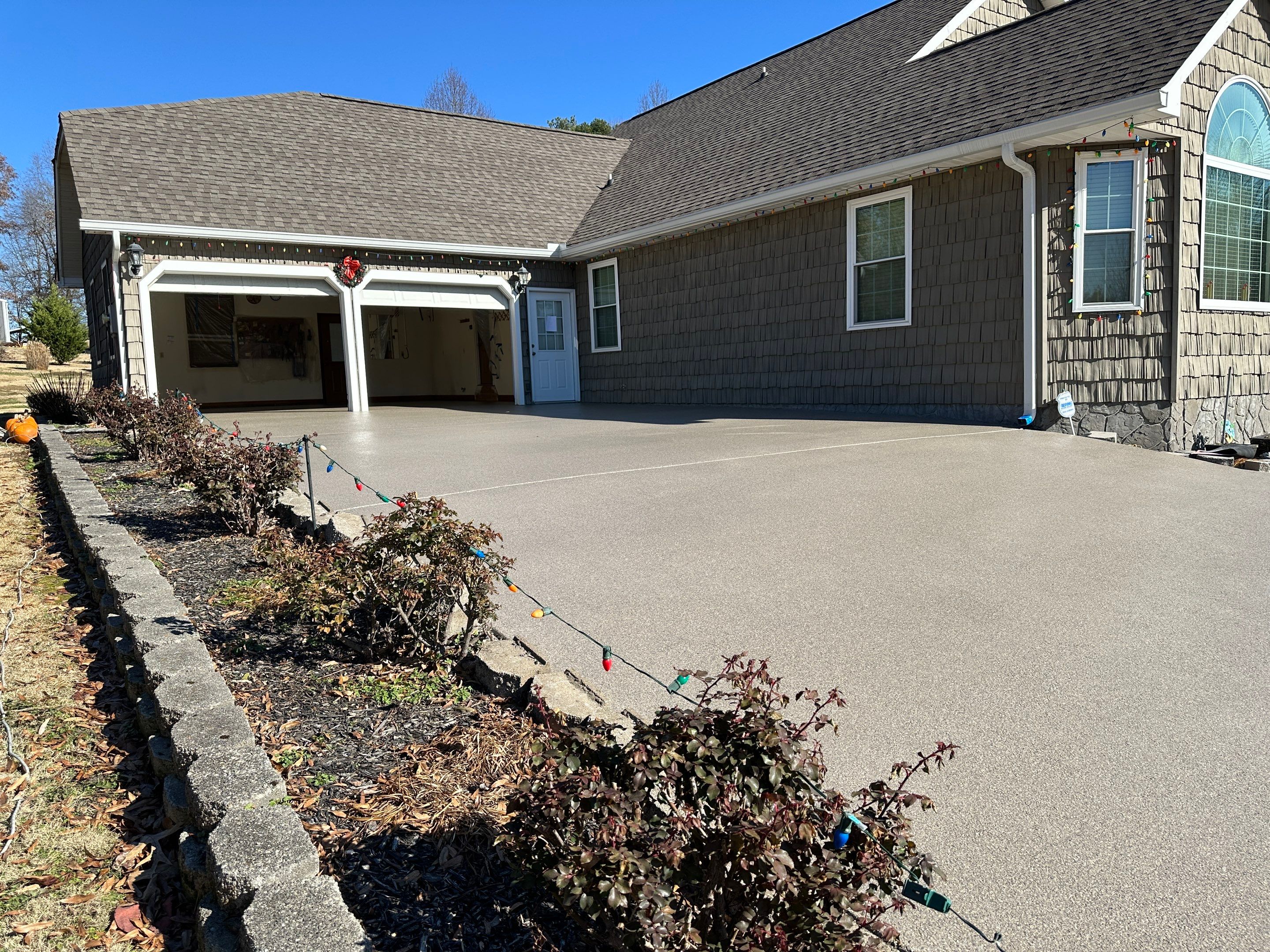 Driveway using Obsidian by Elite Floor Solutions