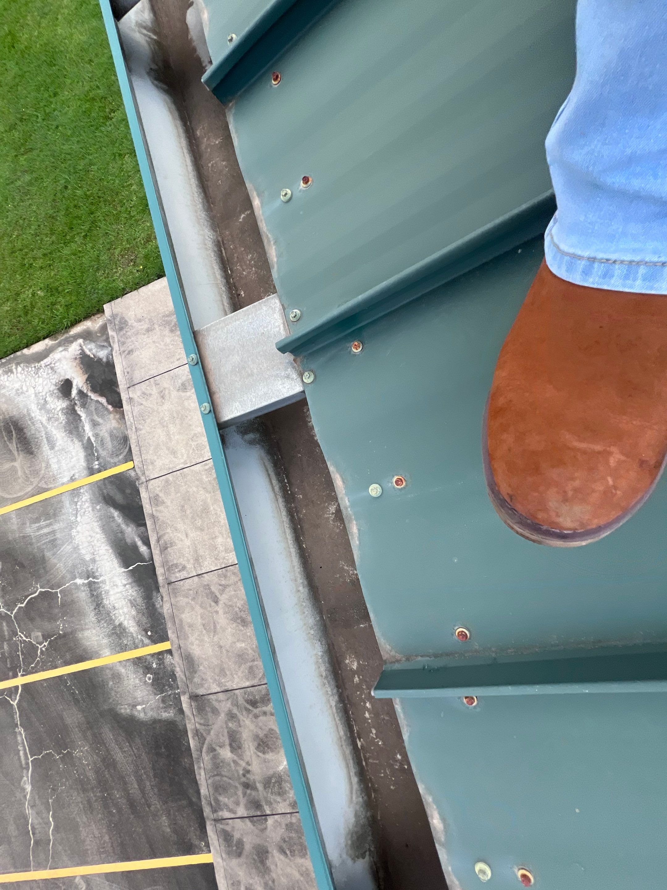 Hail Damage using Metal by Roof Repair Company