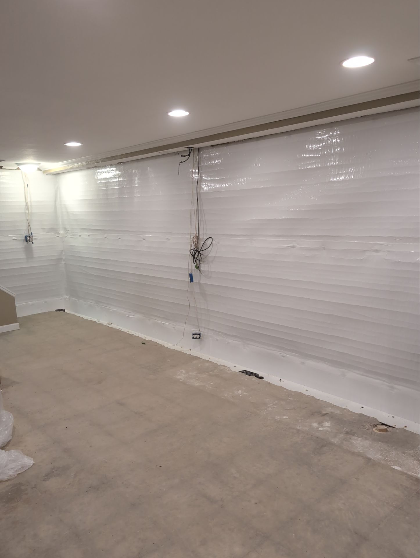 Interior Basement Waterproofing System and Egress Window Installation by Toledo Basement Repair 