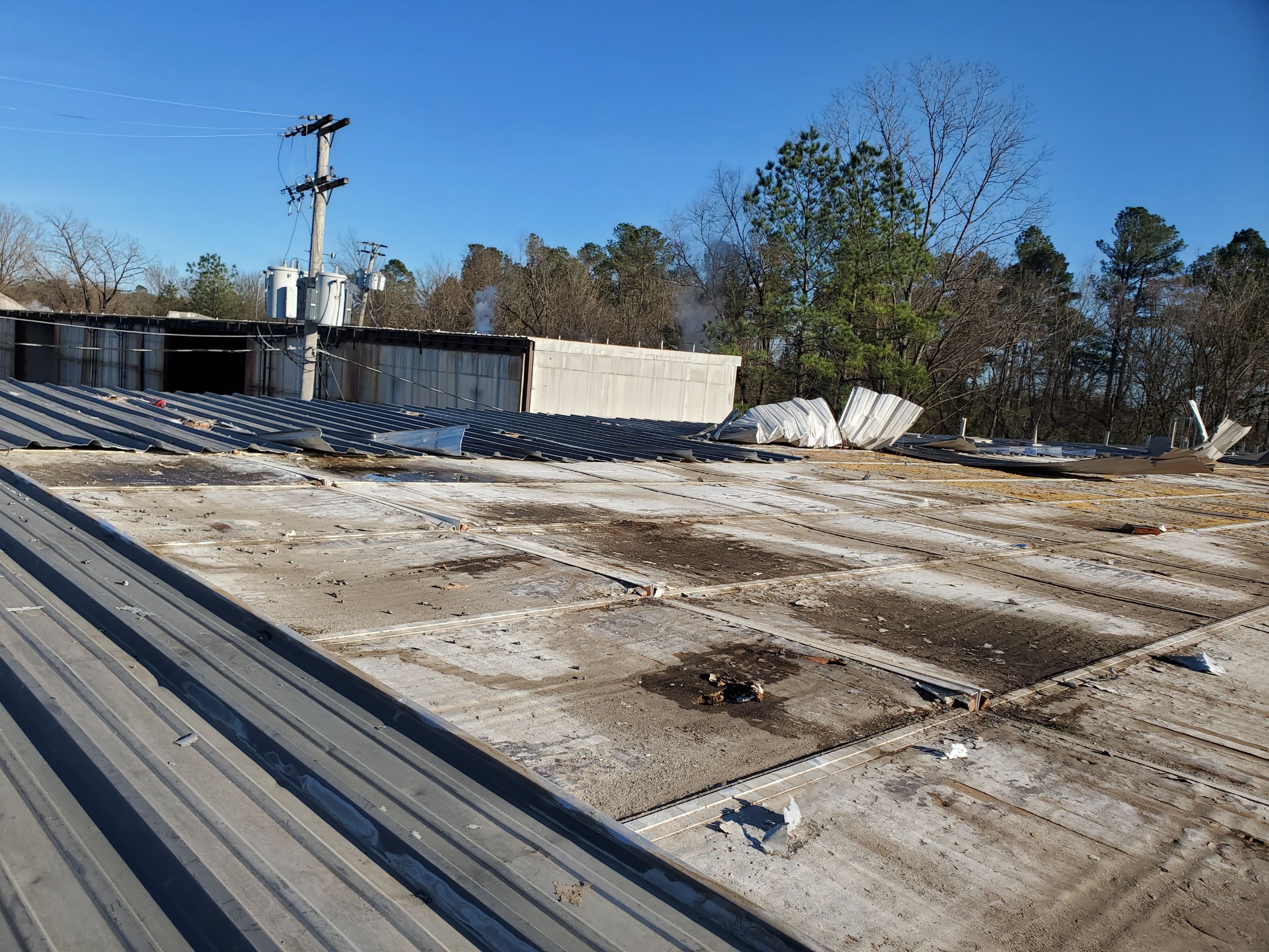 Commercial Roofing Installation using Aluminum Roofing panels by Hostetler Roofing