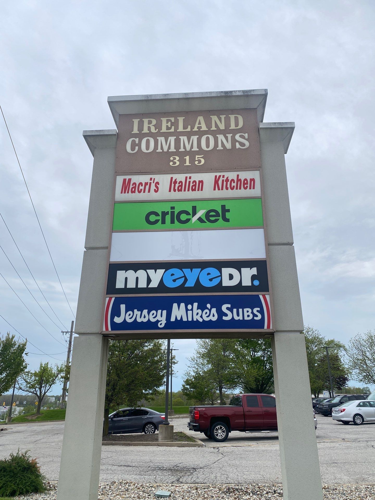 Monument Sign Maintenance and Storefront Graphic Updates for Ireland Commons by Hayes Design co