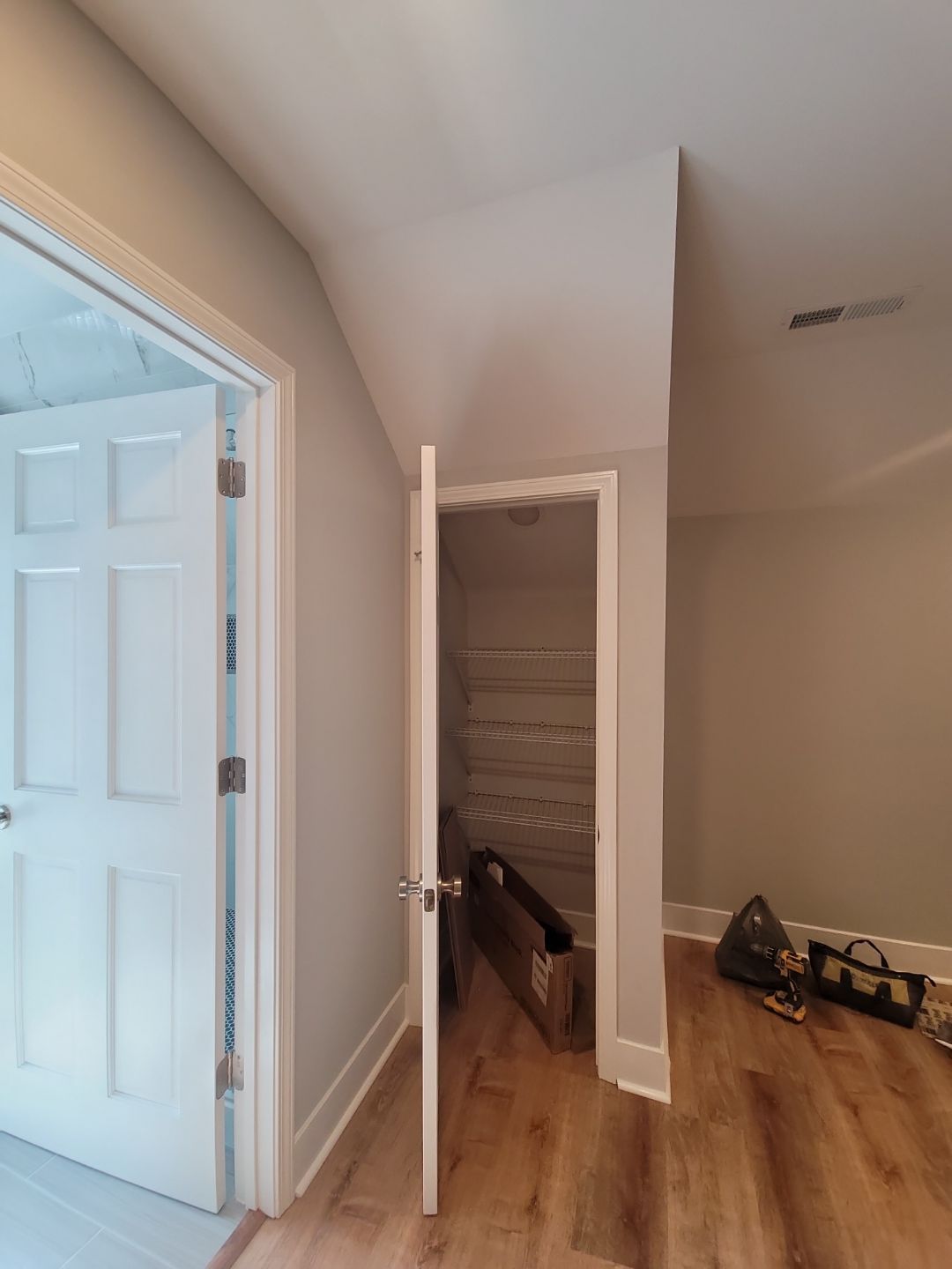 From Rafters to Retreat: An Attic Transformed with a Luxe Bath Escape by Elite Remodeling and Design LLC