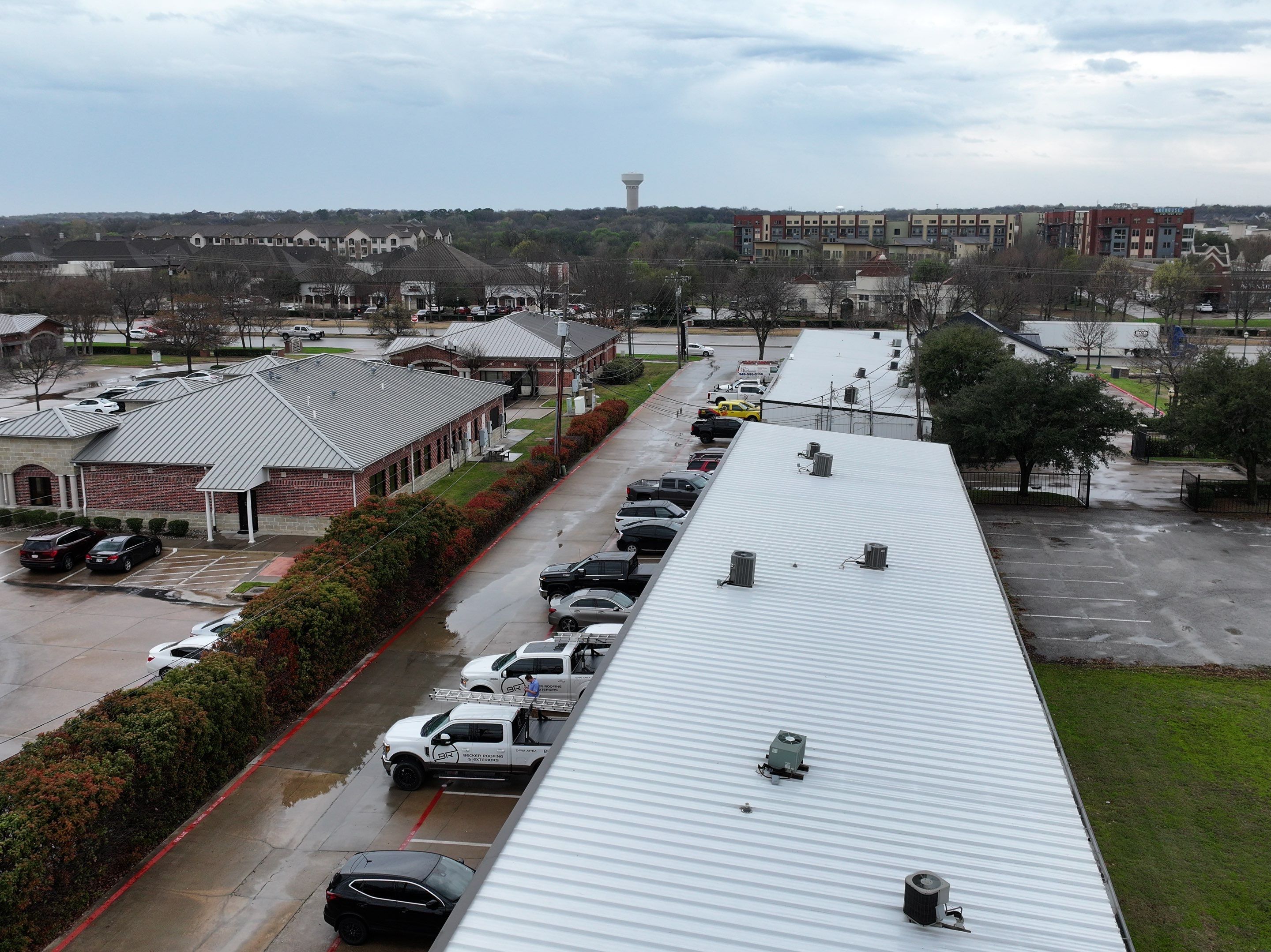 Commercial Roofing Installation using Double lock Mechanical Standing Seam Metal by Becker Roofing and Exteriors
