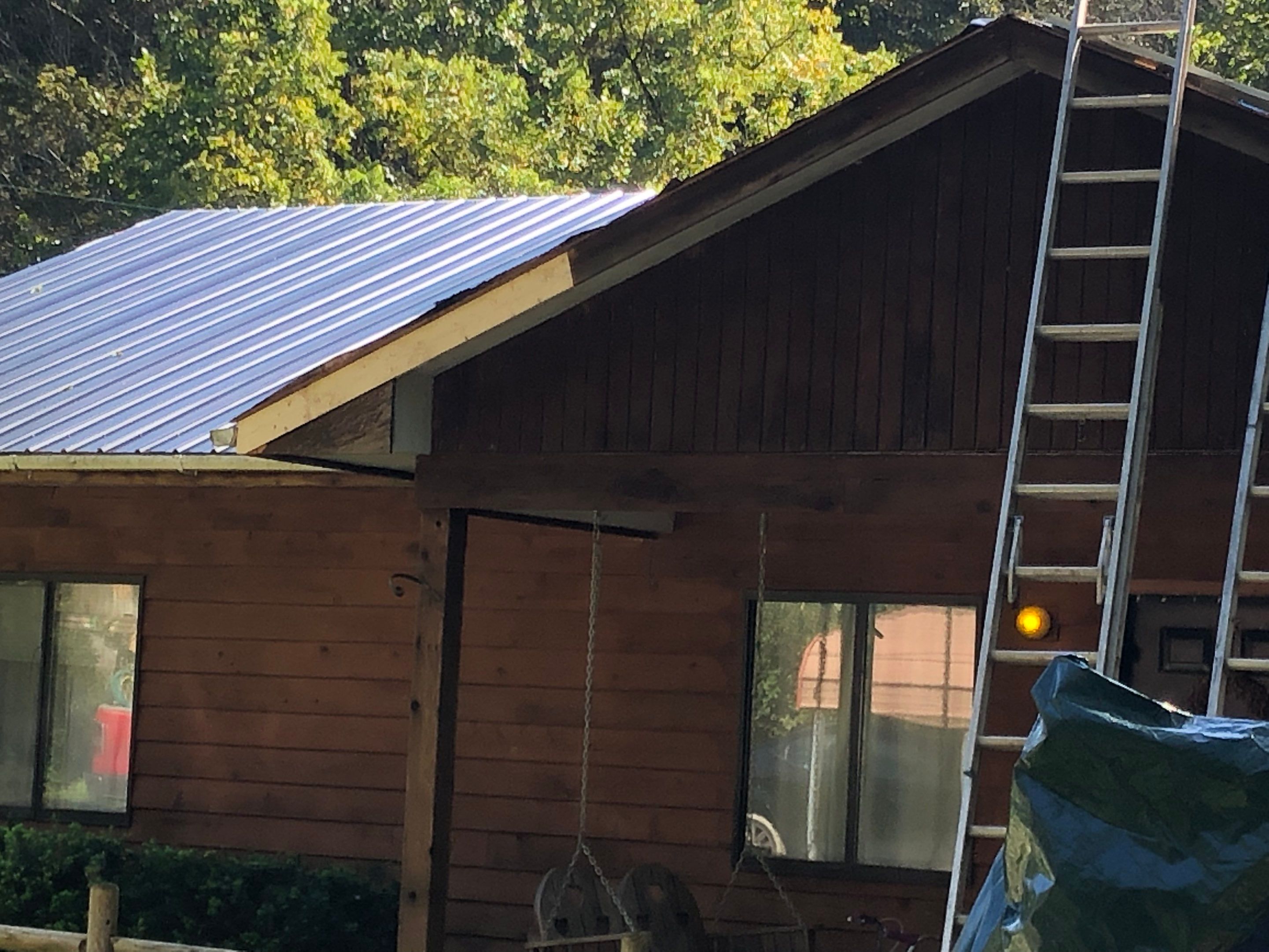 Metal Roof and Vinyl Siding, Soffit, Gutters using LifeTite Premium metal roofing  by Secure Construction Company Inc