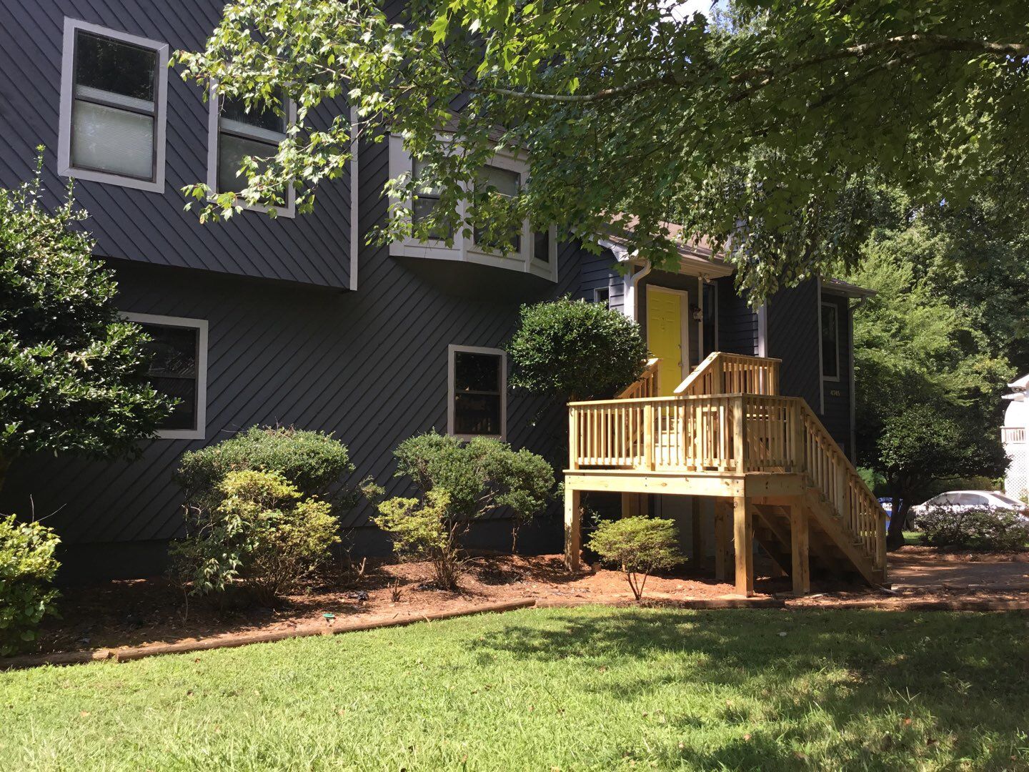 Elevated Wooden Deck and Front Porch Renovation in Marietta by Swift Home Renovations 