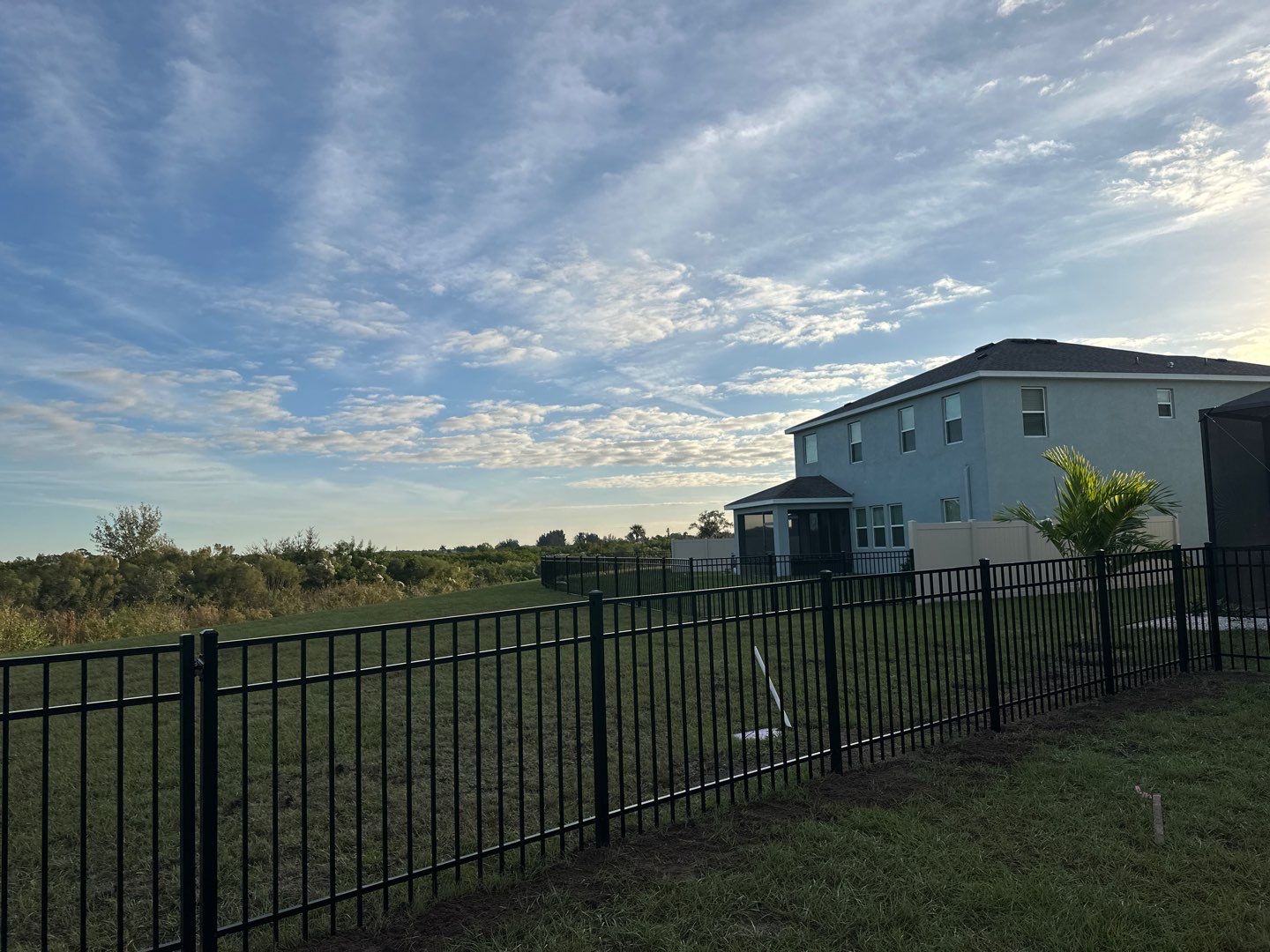 Vinyl Fence Installation using Vinyl Fence and a Black 3 Rail Aluminum Fence by Asap fence and gates, LLC