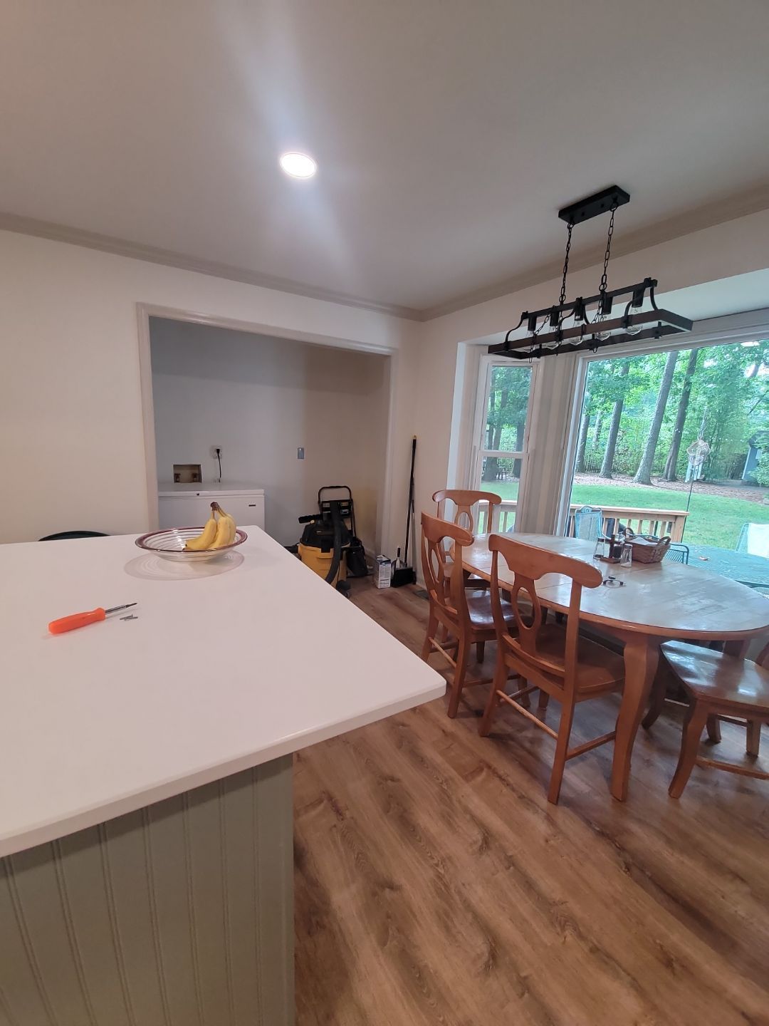 A Pathway to Personality – A Two-Tone Kitchen Transformation in Apex by Elite Remodeling and Design LLC