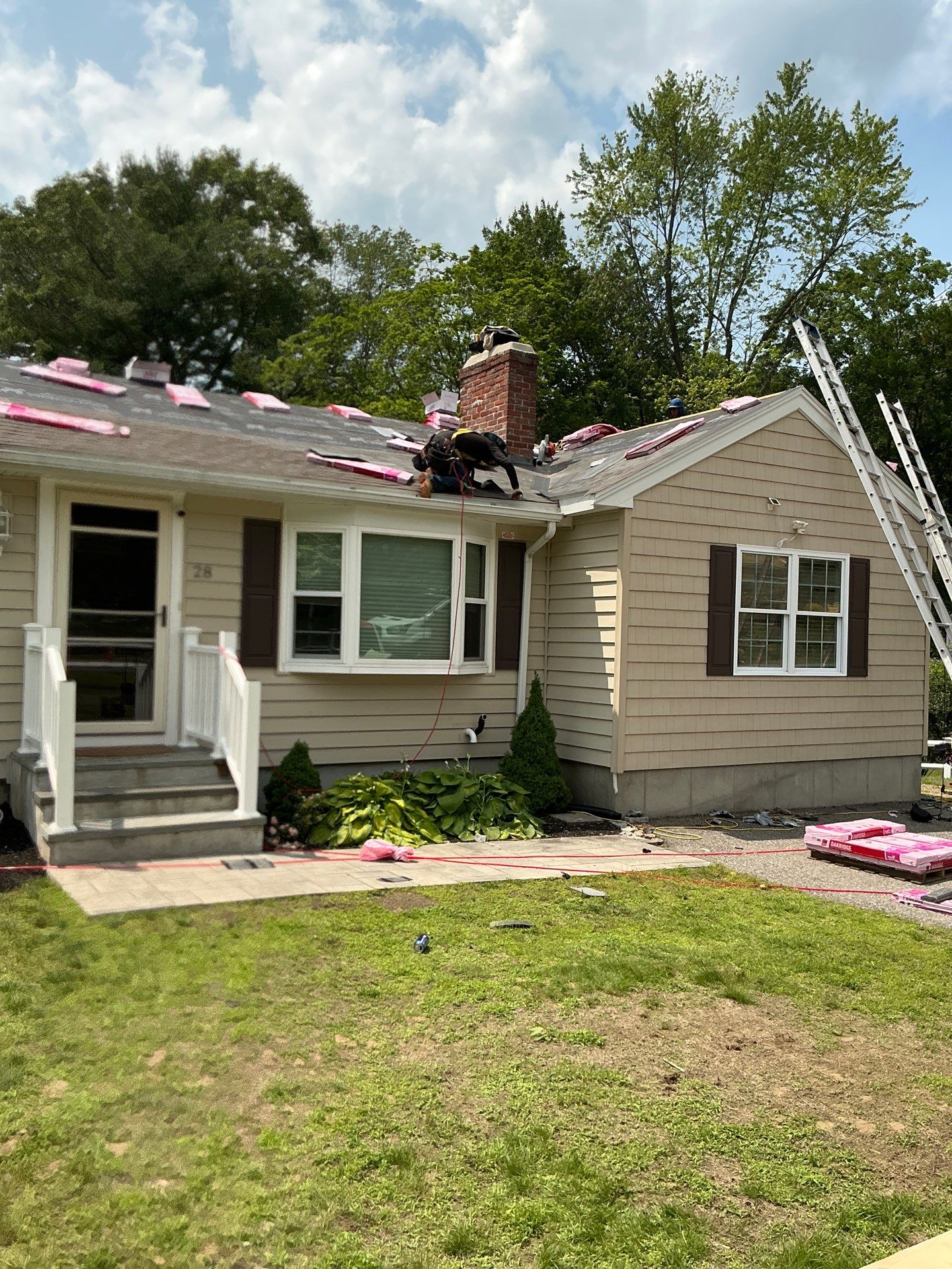 Full Roof Replacement & Chimney Repair – Onyx Black, MA by Mighty Dog Roofing of Greater Middlesex County