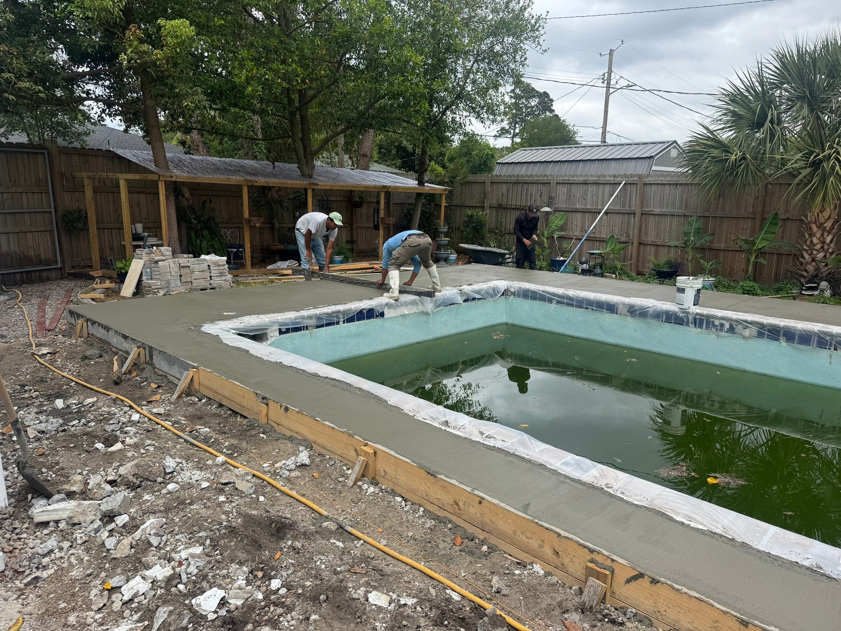 Savannah Pool Deck Replacement with Textured Concrete and Brick Coping by Lowcountry Scapes, LLC