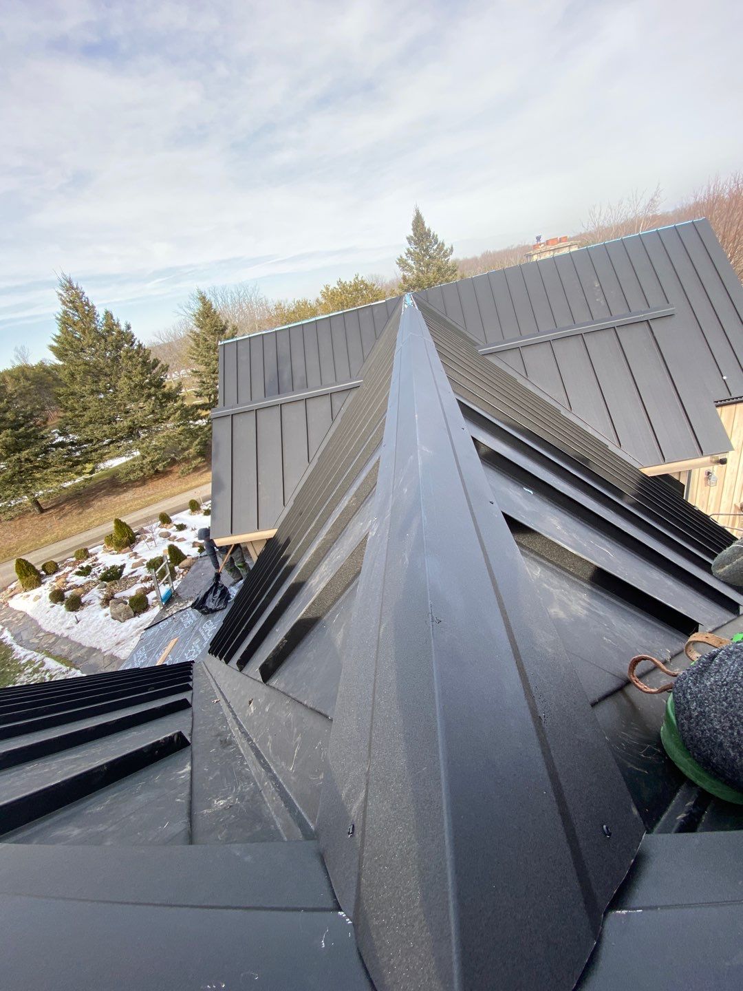 Residential Roofing Installation using 24 Ga Standing Seam Metal by Jay Carter Roofing & Sheet Metal