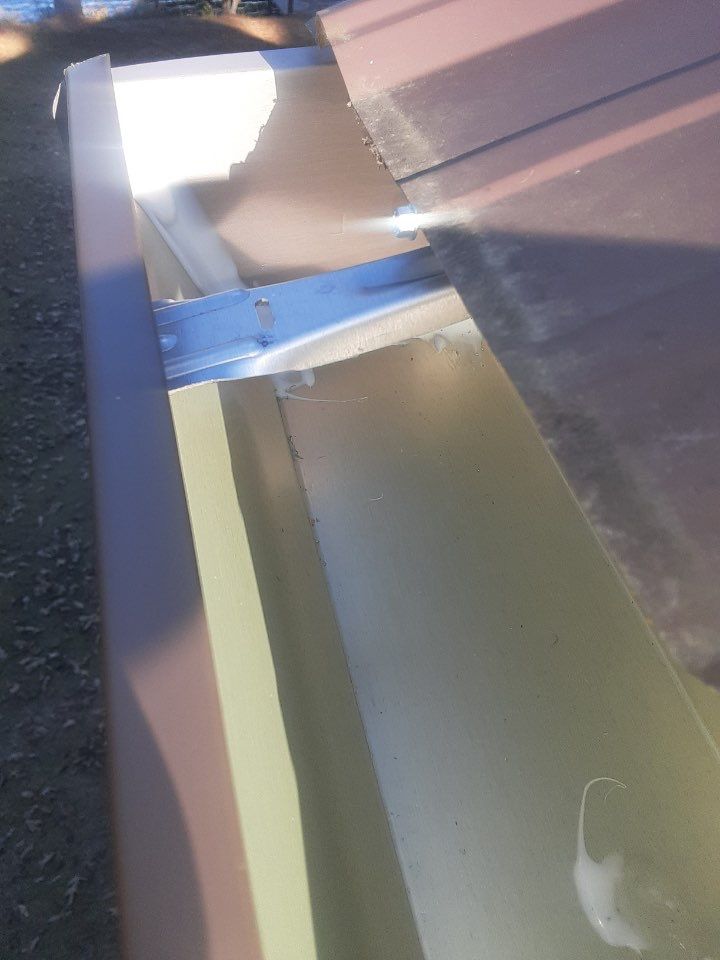 Gutter Installation using Royal Brown K-Style Seamless Gutters and LeafBlaster Pro Gutter Guards by Gutter Professors