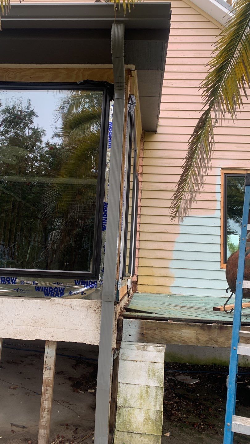 Seamless Gutter Installation using Charcoal Grey Gutters by Gutter Professors