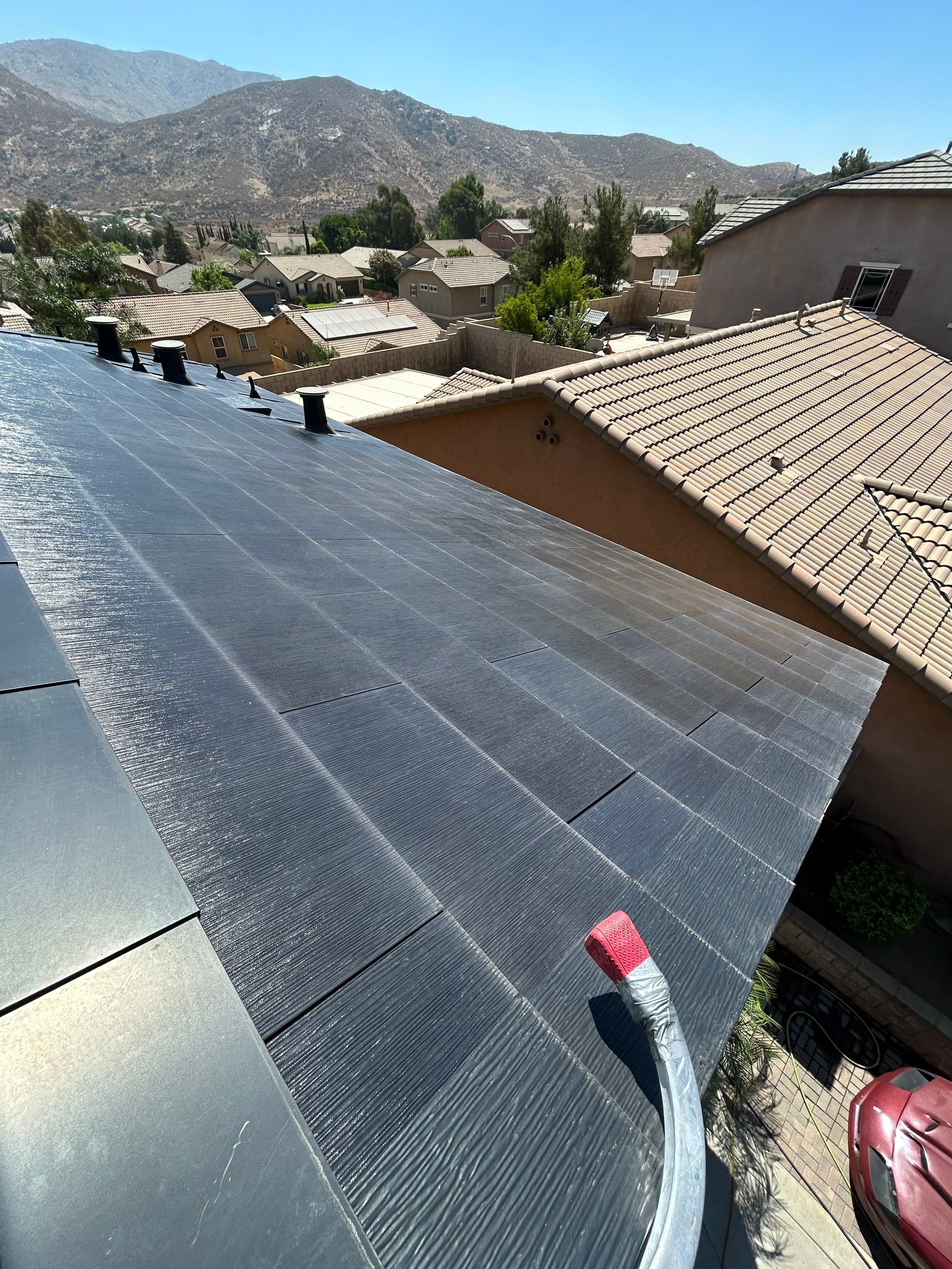 Tesla Roof Cleaning in Fontana California by Palm Coast Solar Cleaning